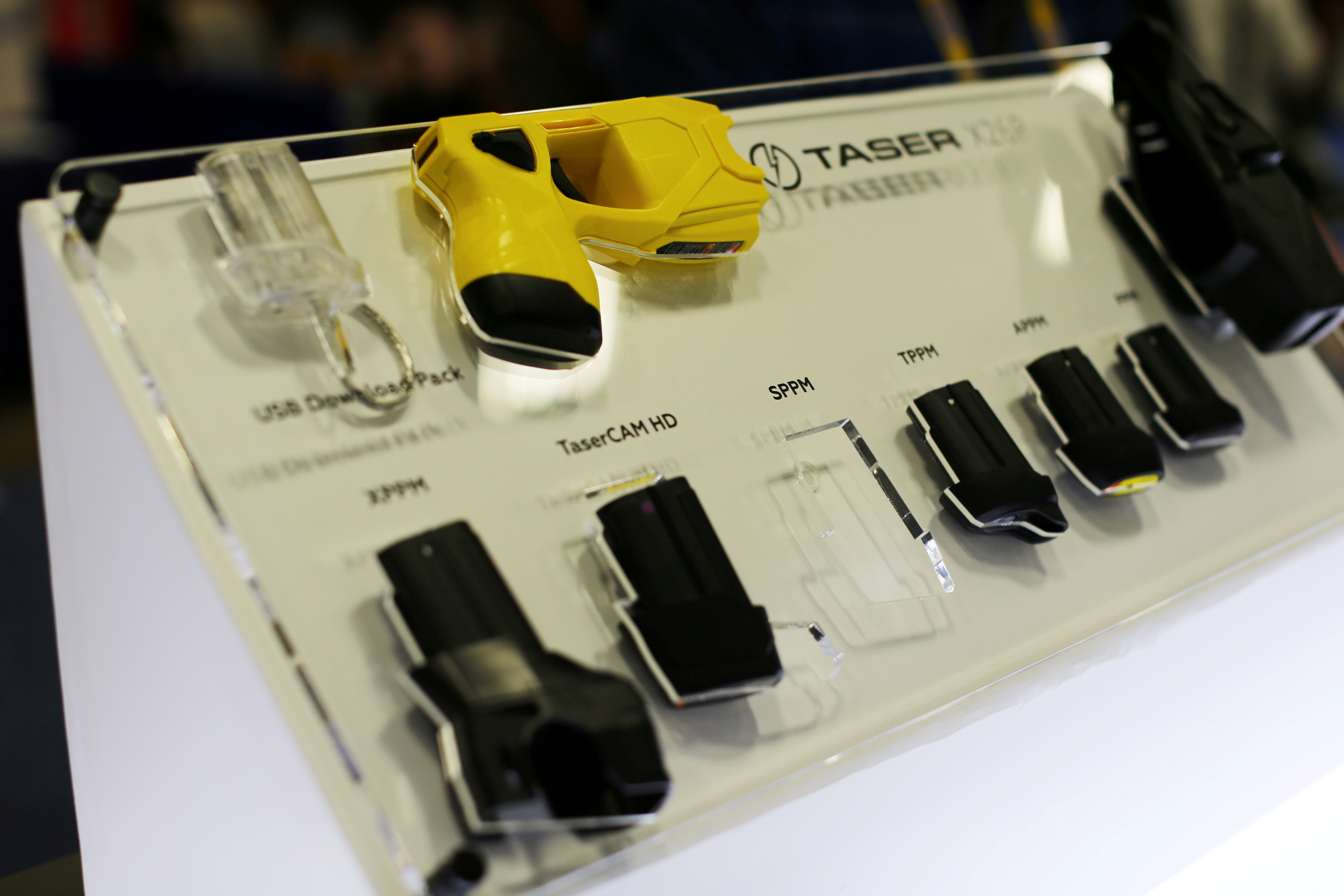 An X26P Taser gun is shown on display at the Taser booth during the International Association of Chiefs of Police conference in San Diego