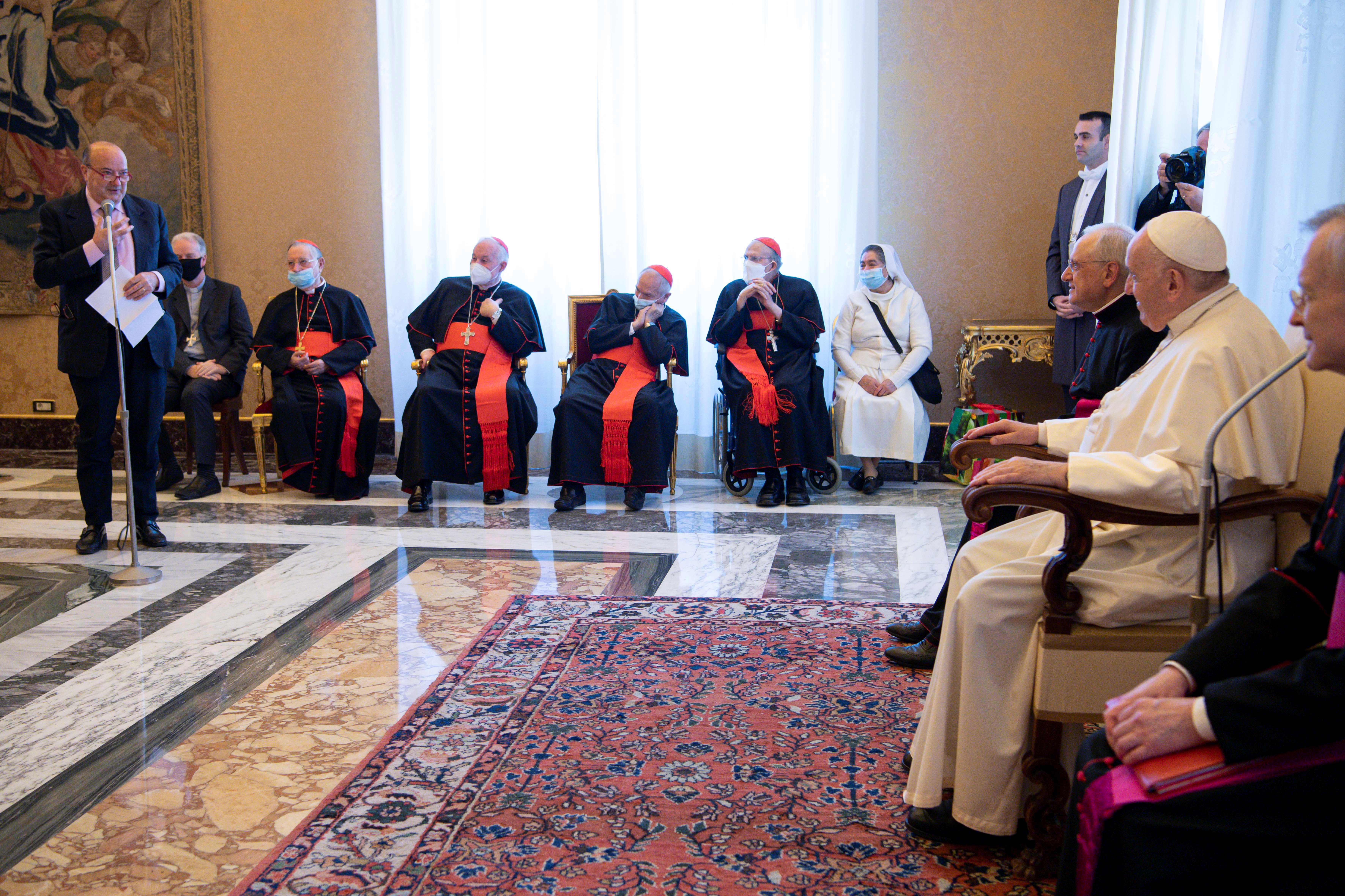 Pope Francis attends a ceremony to honour veteran Vatican correspondents Philip Pullella and Valentina Alazraki at the Vatican