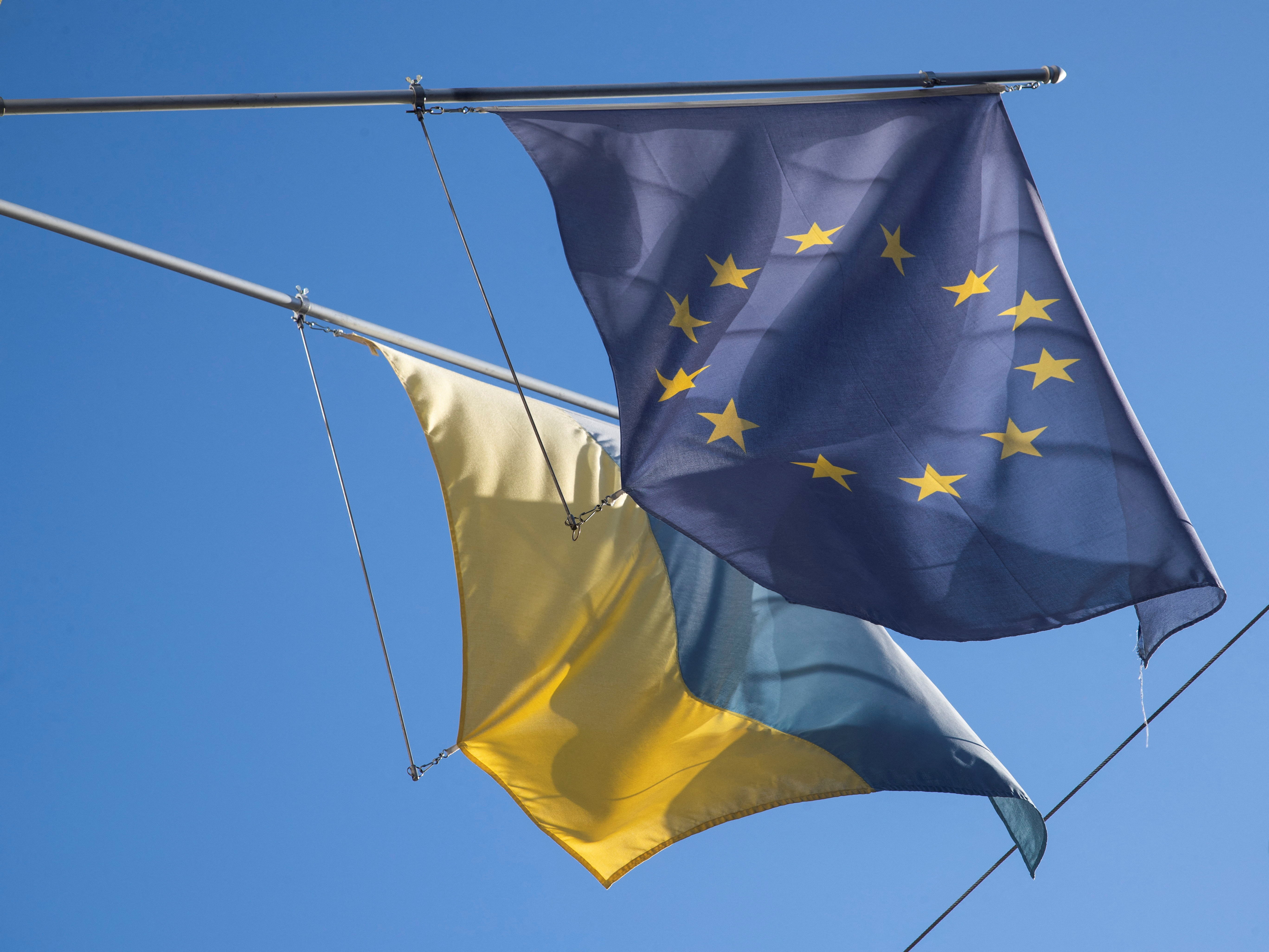 Flag of EU flies next to Ukraine's national flag in Bern