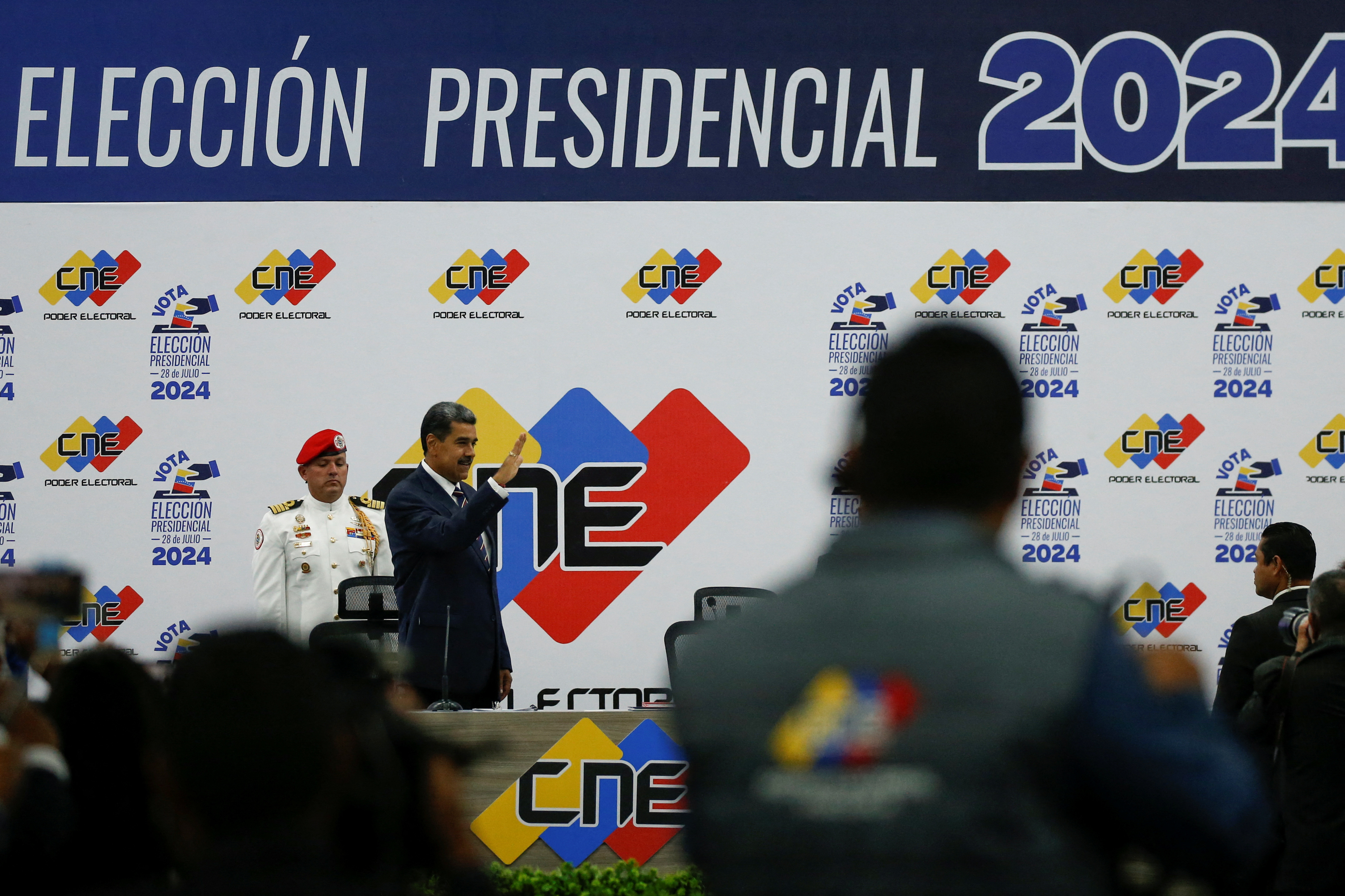 Venezuela's President Nicolas Maduro meets with Elvis Amoroso, head of the CNE, in Caracas