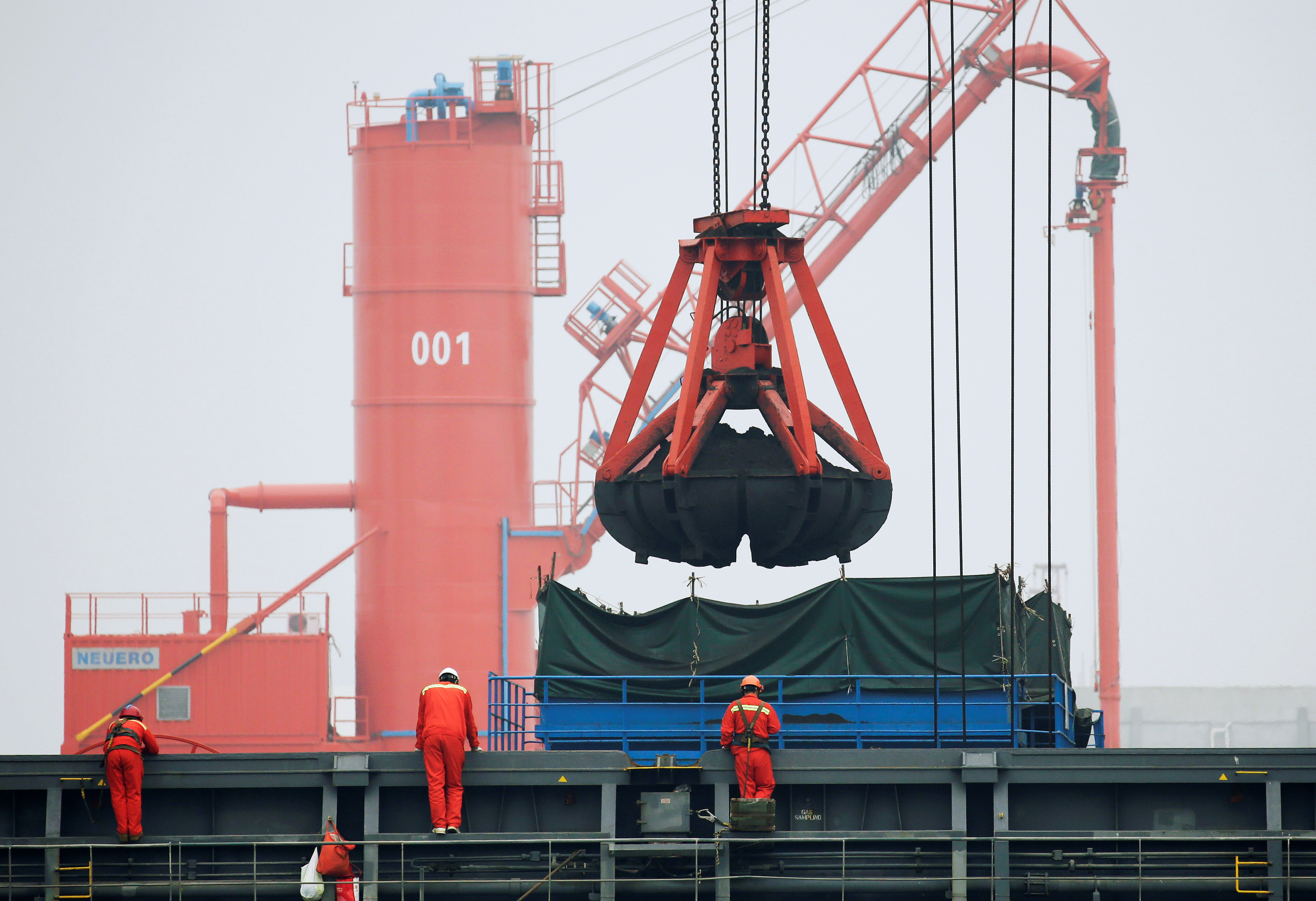 Coal is loaded into a bulk carrier at Qingdao Port Shandong province