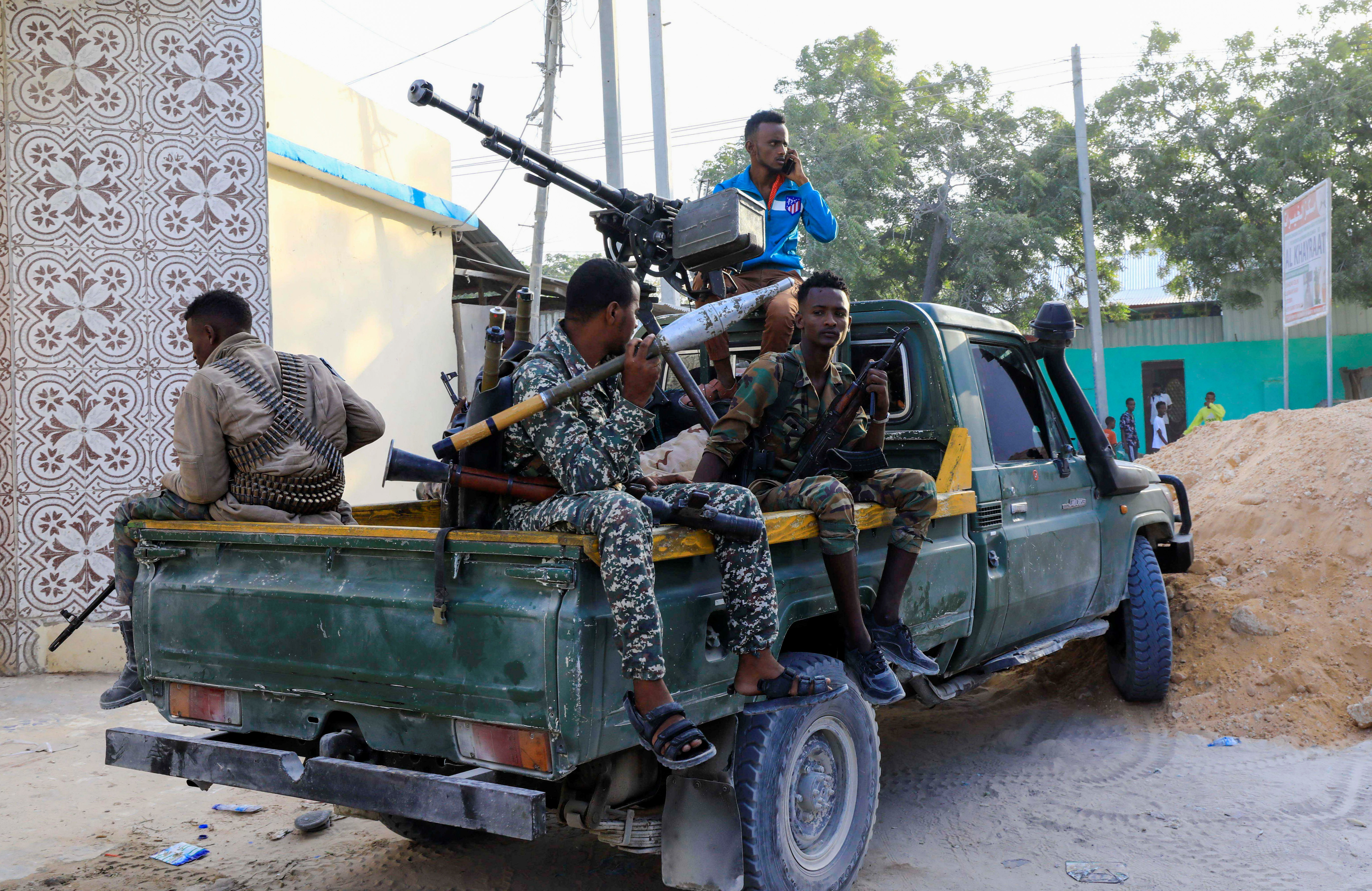 Force members loyal to former Police Commander Sadaq Omar Hassan gather in Hodan district of Mogadishu