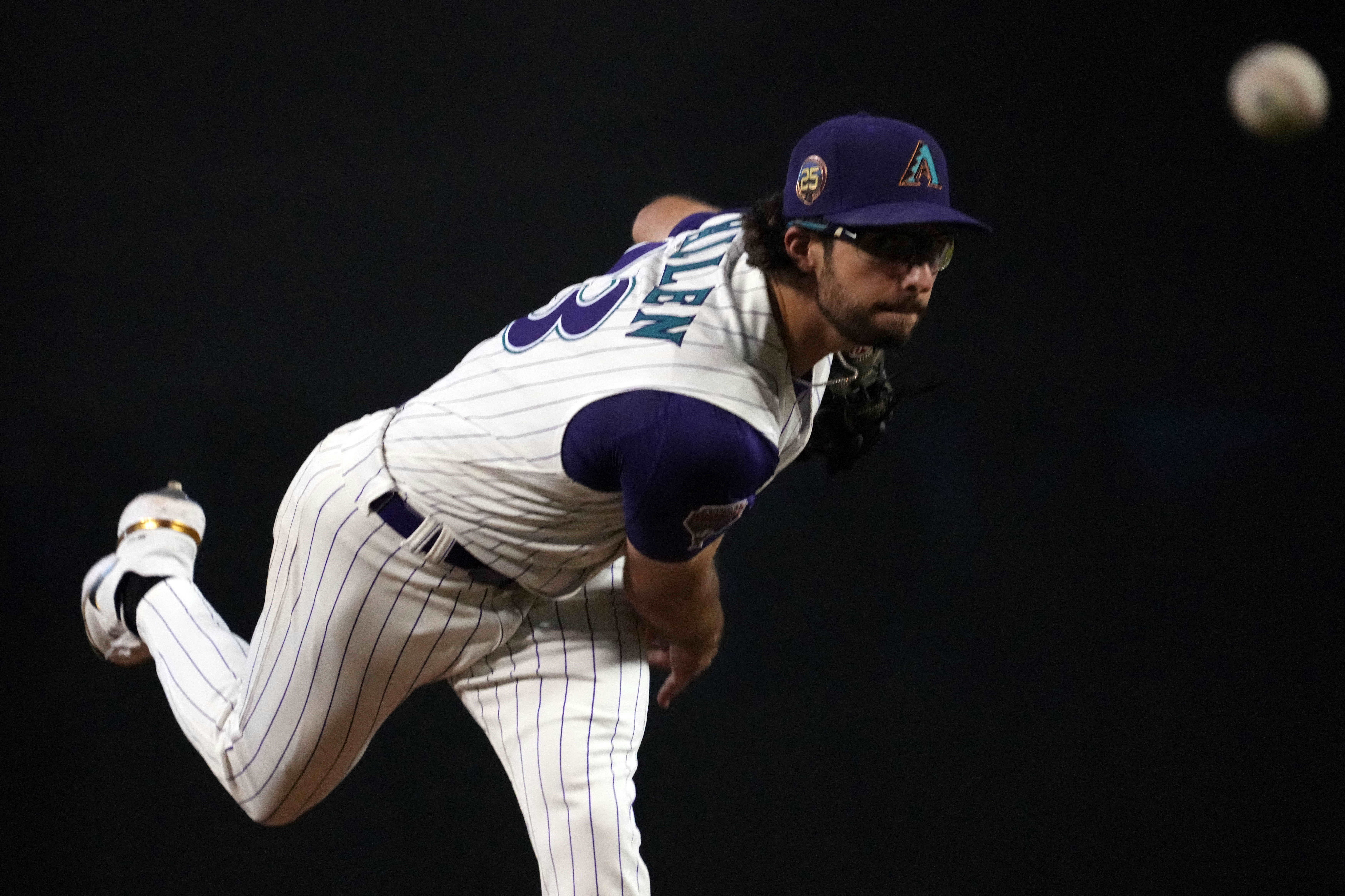 Arizona Diamondbacks starting pitcher Zac Gallen works against a San Diego  Padres batter during the first inning of a baseball game Tuesday, April 4,  2023, in San Diego. (AP Photo/Gregory Bull Stock