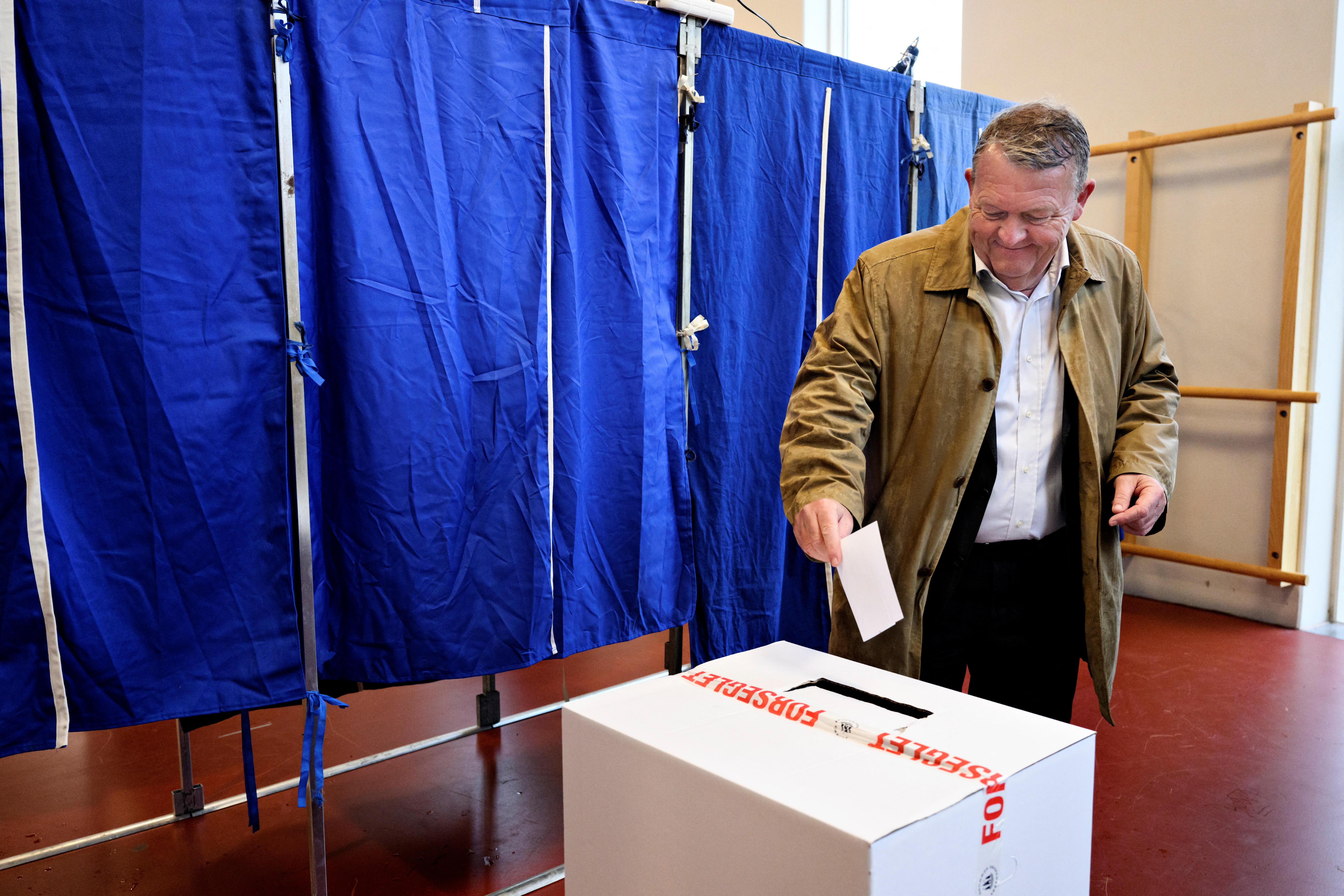 Former Danish prime minister Rasmussen casts his vote during the referendum wether Denmark's participation in the European Union's CSDP