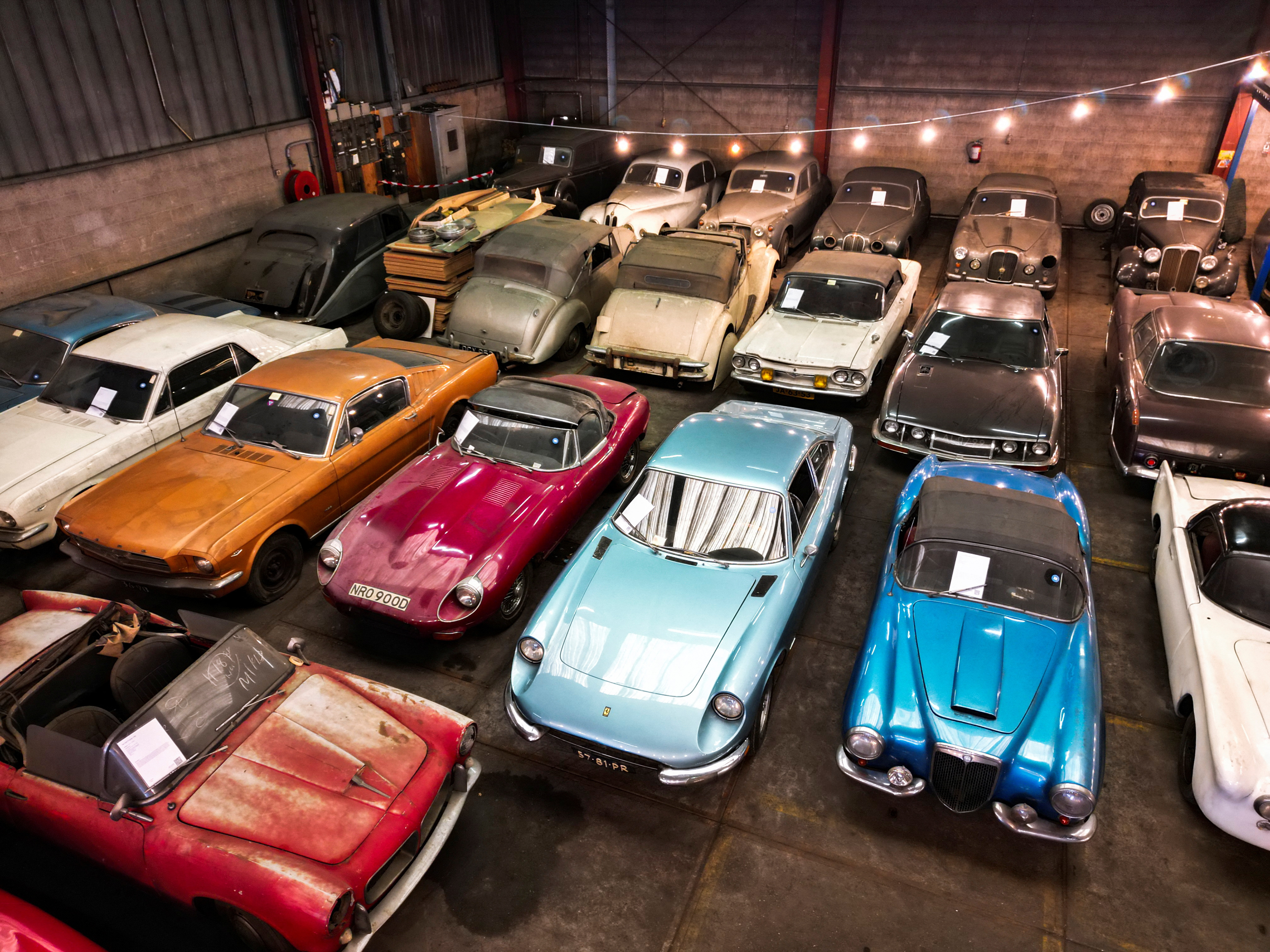 Cars belonging to the Palmen collection are displayed in a warehouse in Dordrecht