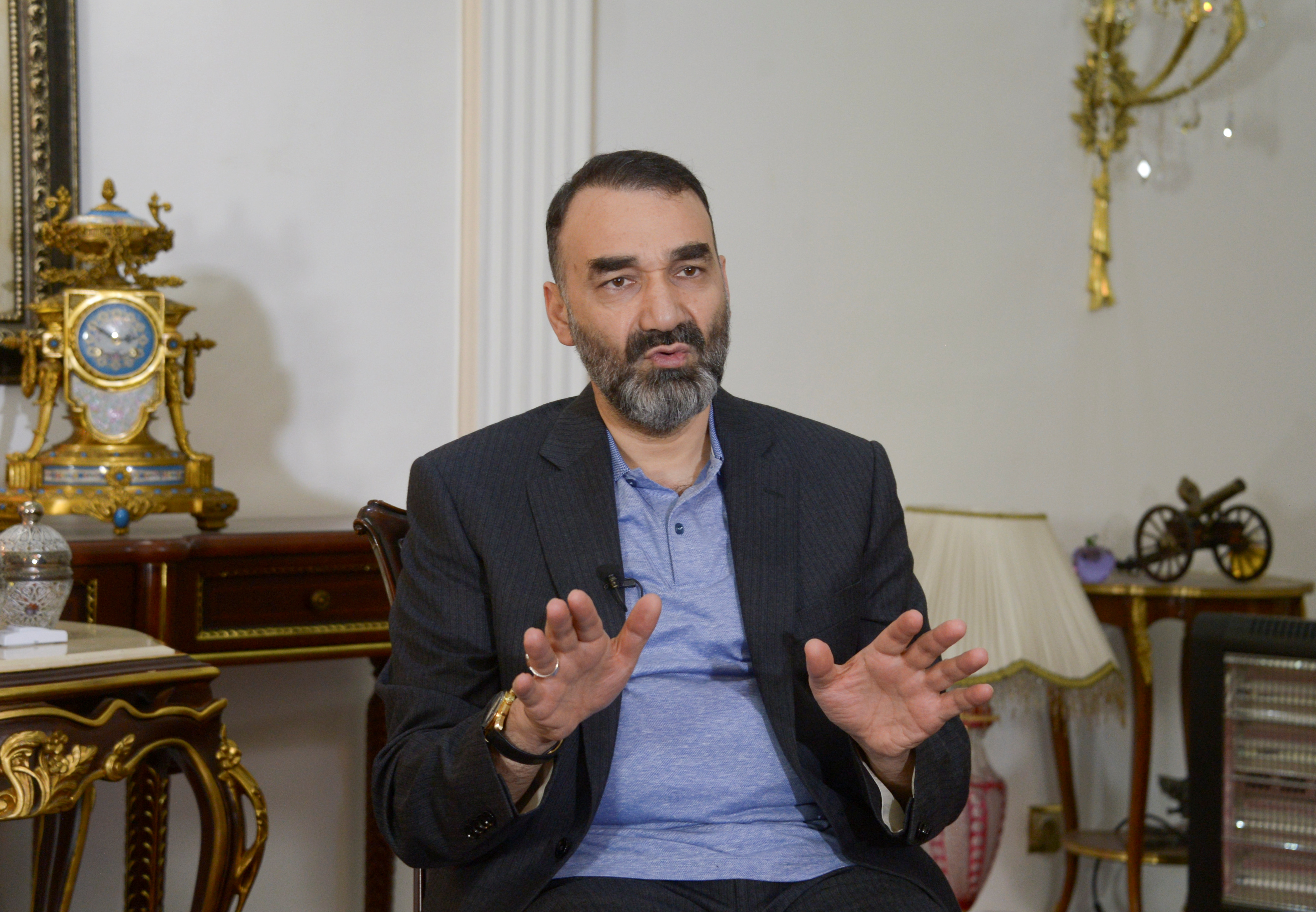 Atta Mohammad Noor, Governor of the Balkh province, speaks during an interview in Mazar-i-Sharif