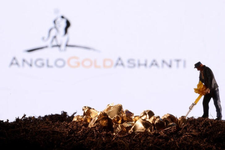 Small toy figure and gold imitation are seen in front of the AngloGold Ashanti logo in this illustration