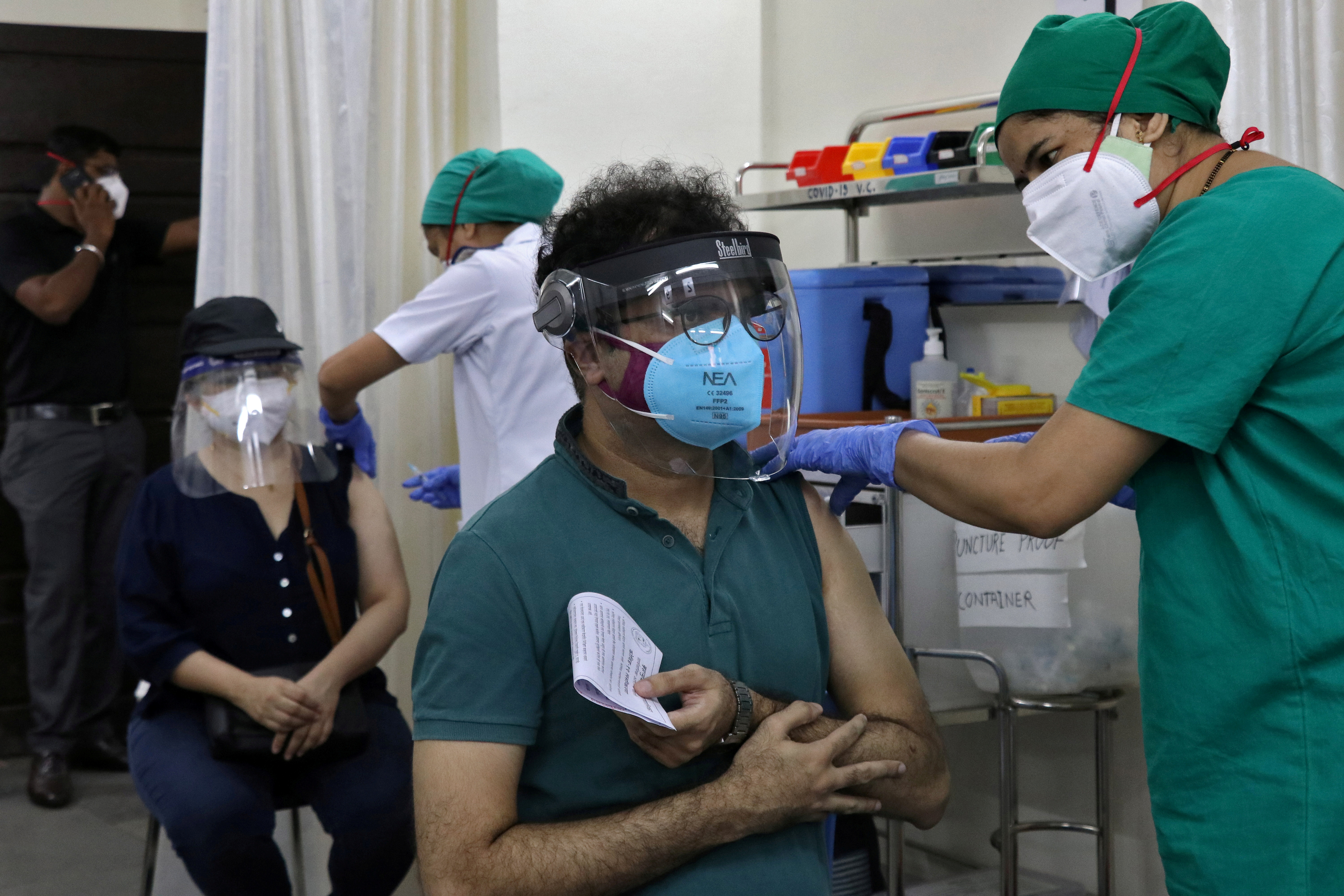 Viral Kothari, 39, receives his first dose of COVISHIELD, a coronavirus disease (COVID-19) vaccine manufactured by Serum Institute of India, at a vaccination centre in Mumbai, India, May 3, 2021. REUTERS/Niharika Kulkarni/