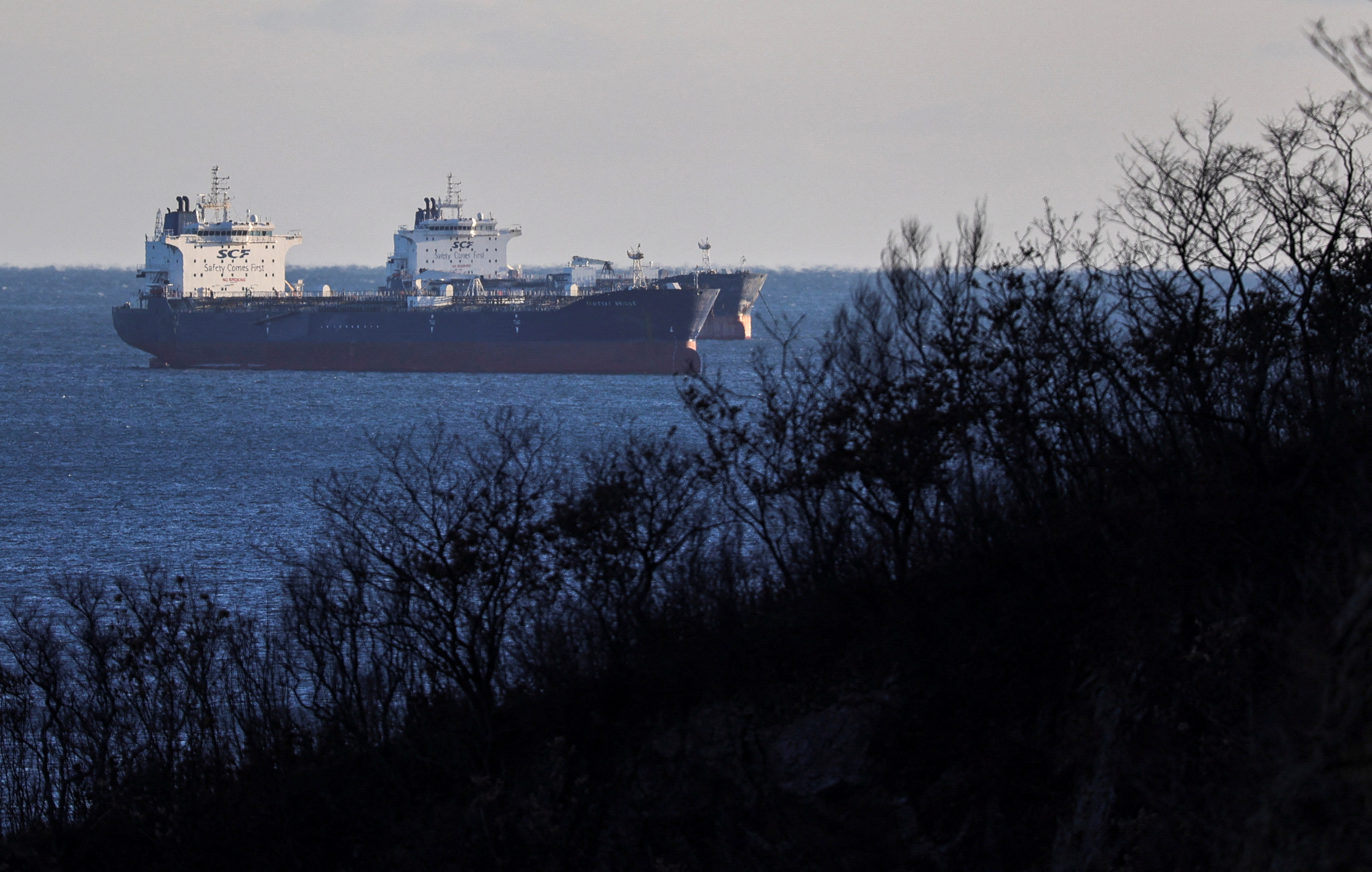 Crude oil tankers lie at anchor in Nakhodka Bay