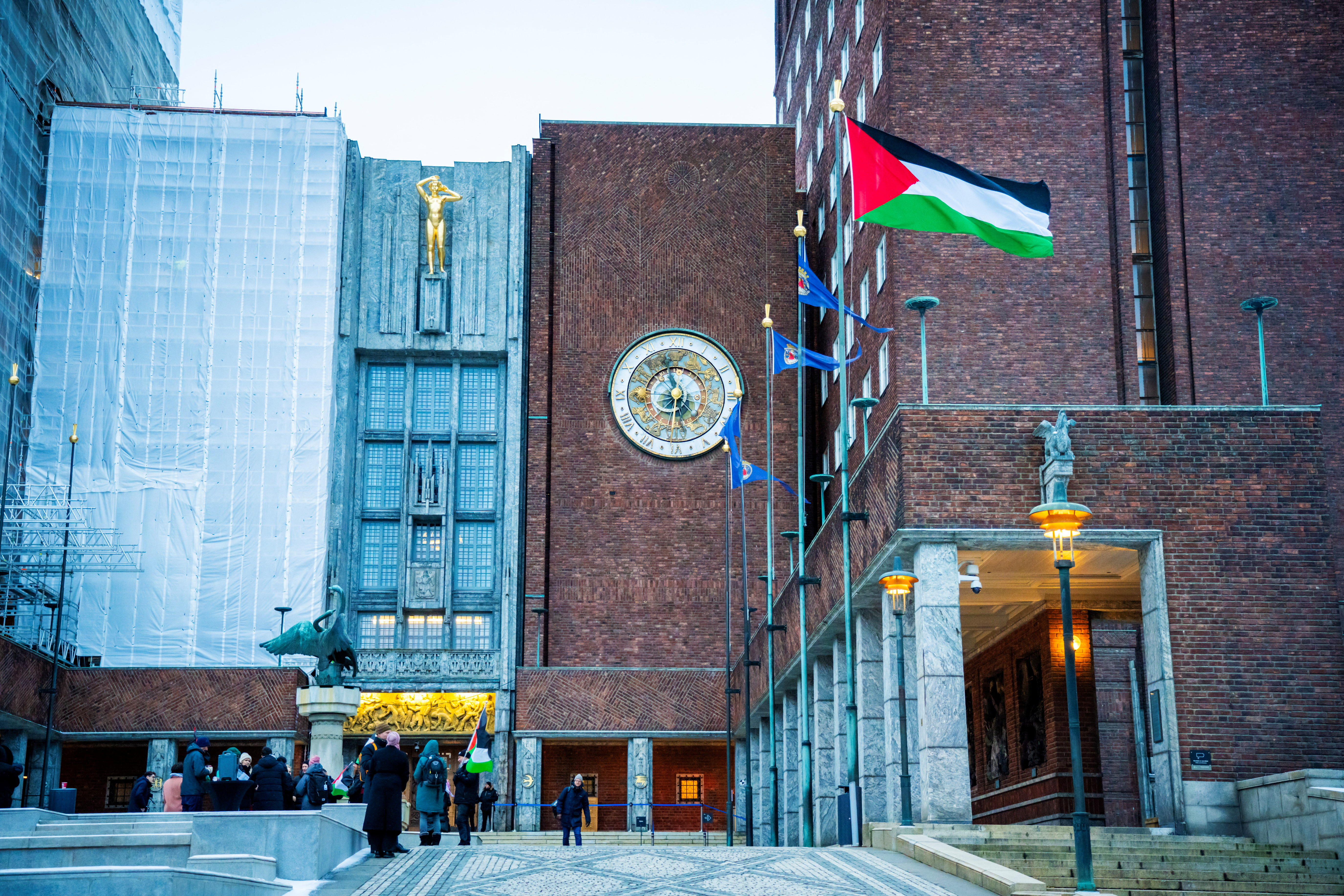 The Palestinian flag is raised outside Oslo City Hall