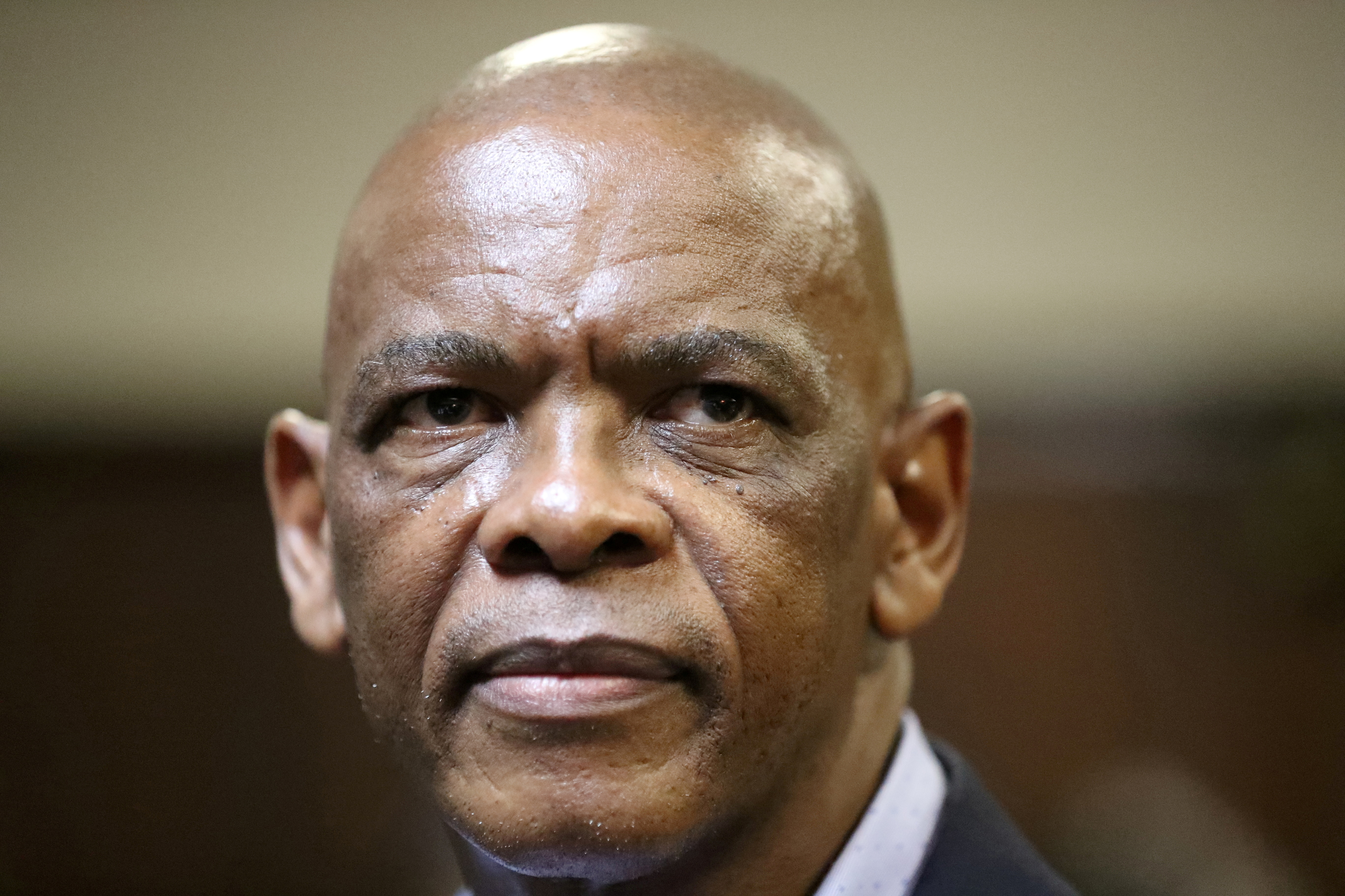 Ace Magashule, secretary general of South Africa's ruling African National Congress, looks on as he appears in Bloemfontein high court in Free State province