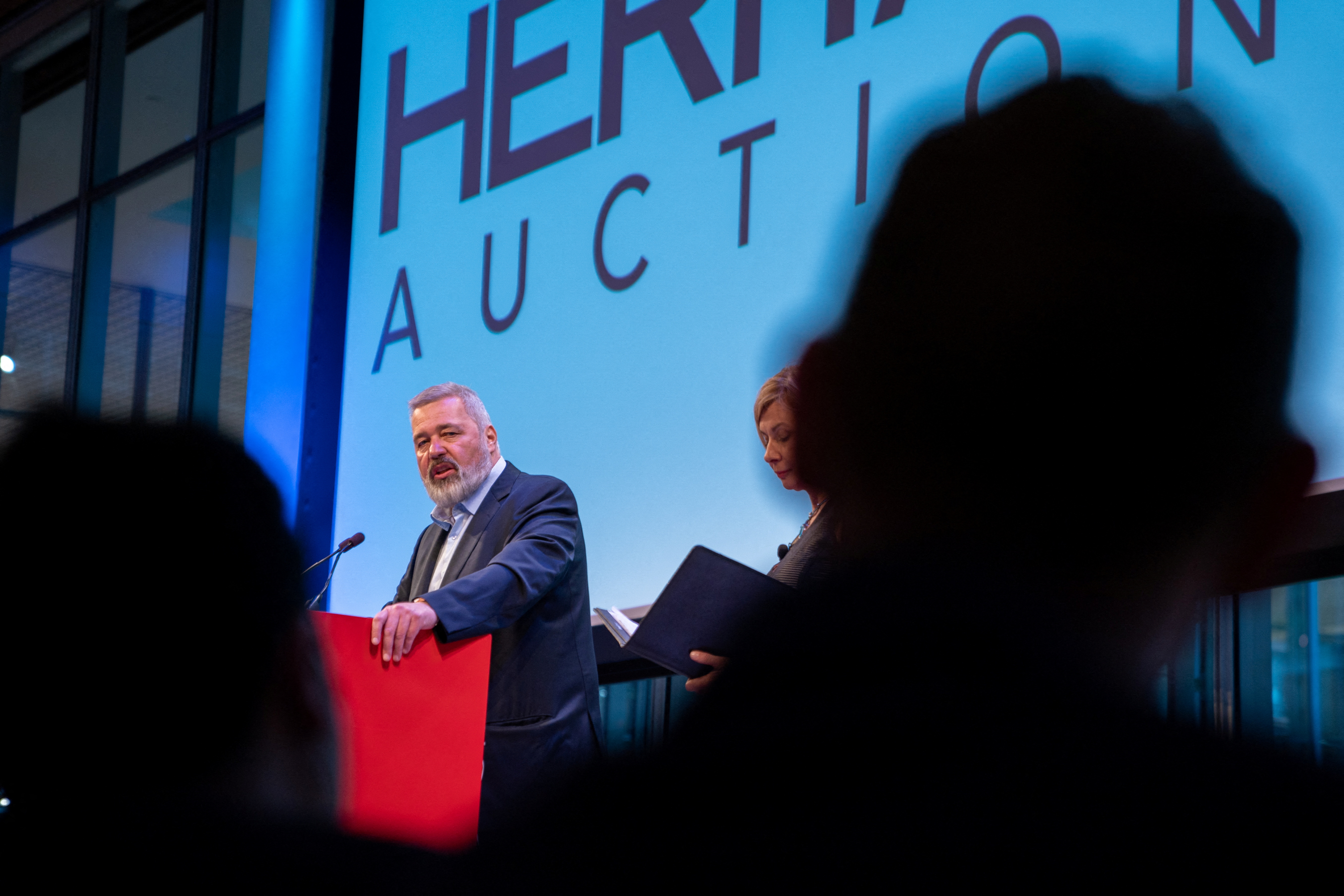 Dmitry Muratov speaks during the auction of his 2021 Nobel Peace Prize medal by Heritage Auctions