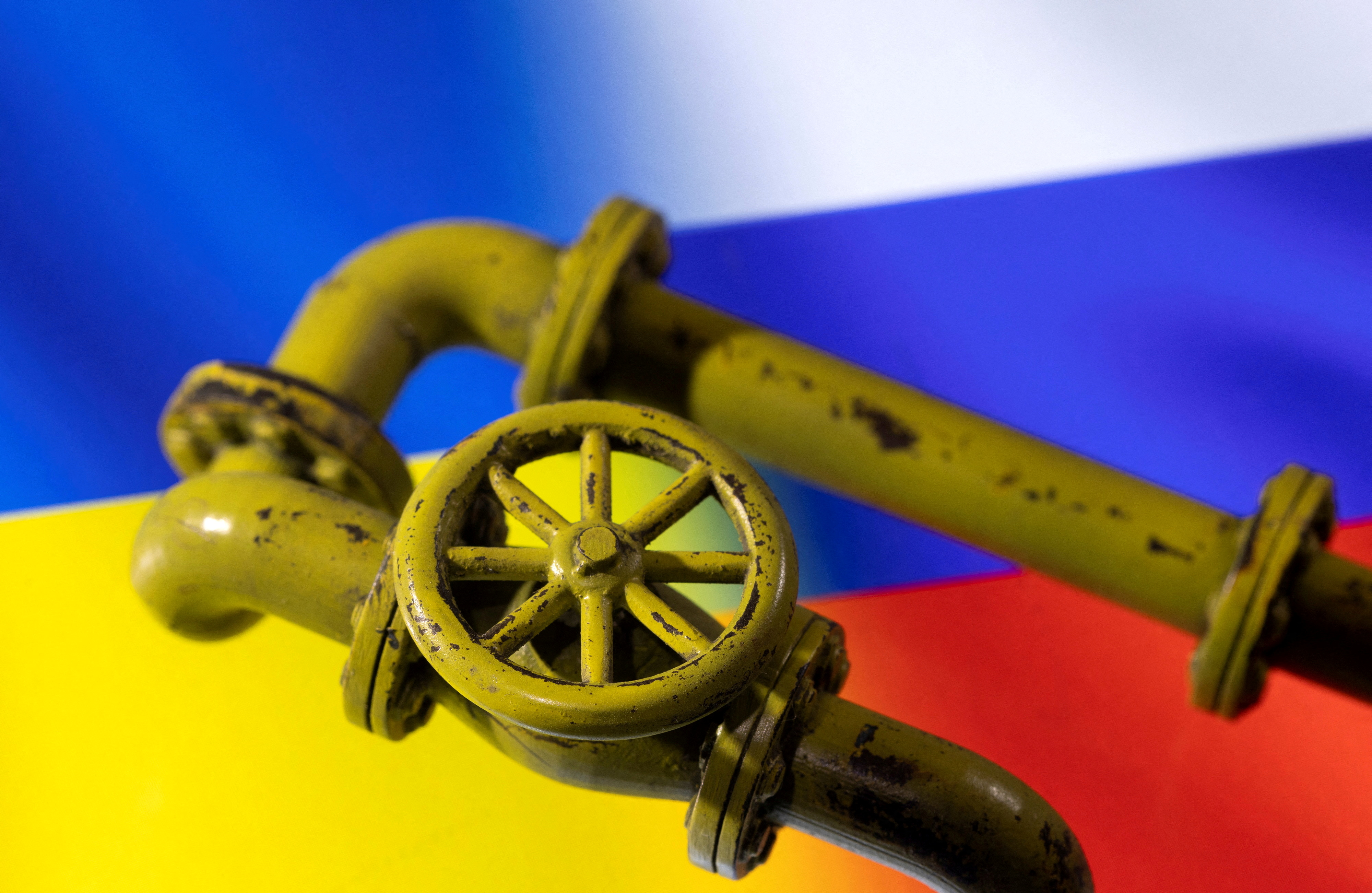 Illustration shows Natural Gas Pipes and Russia's and Ukraine's flags