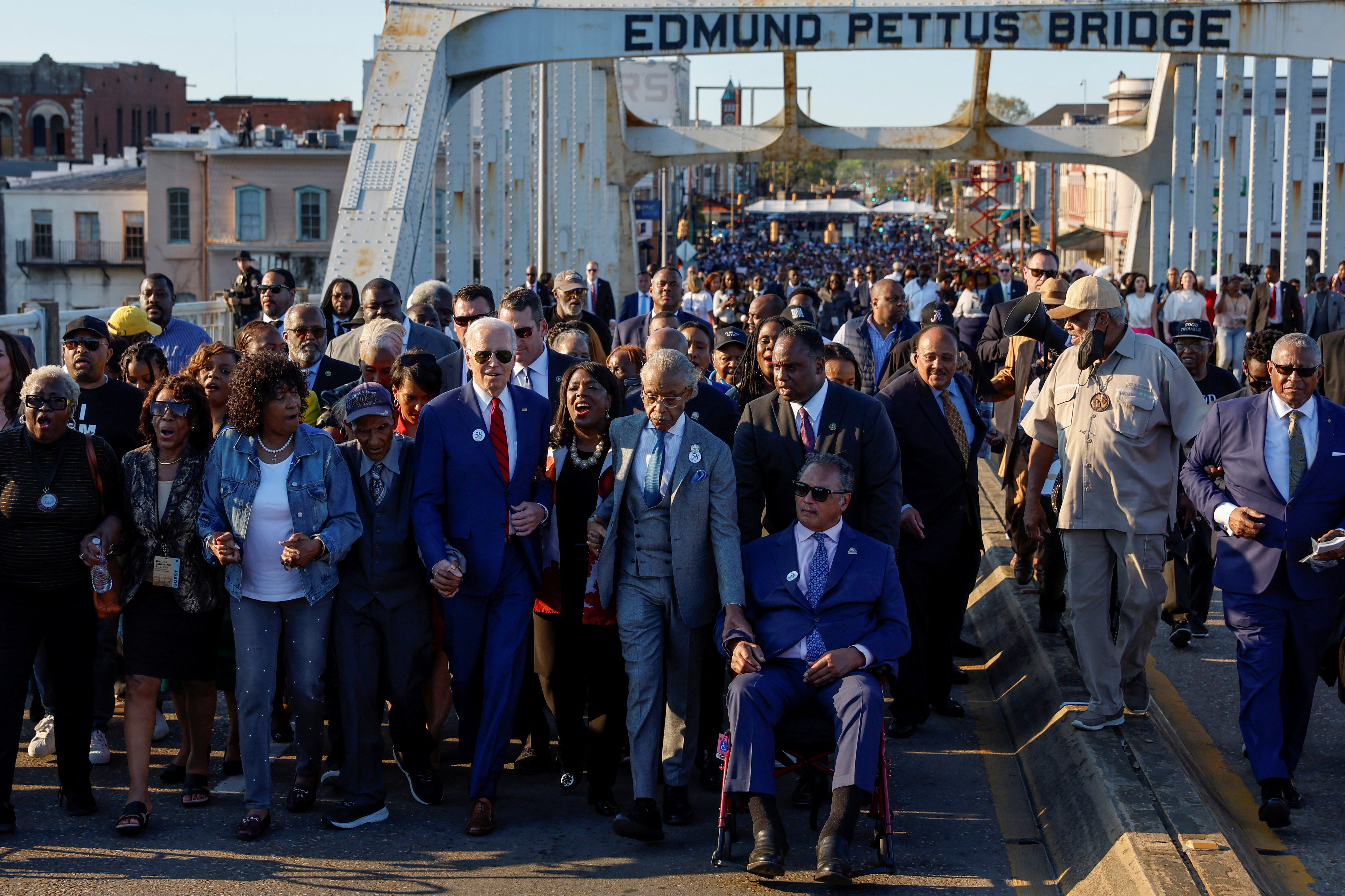 U.S. President Biden participates in a commemorative civil rights march across the Edmund Pettus Bridge in Selma, Alabama