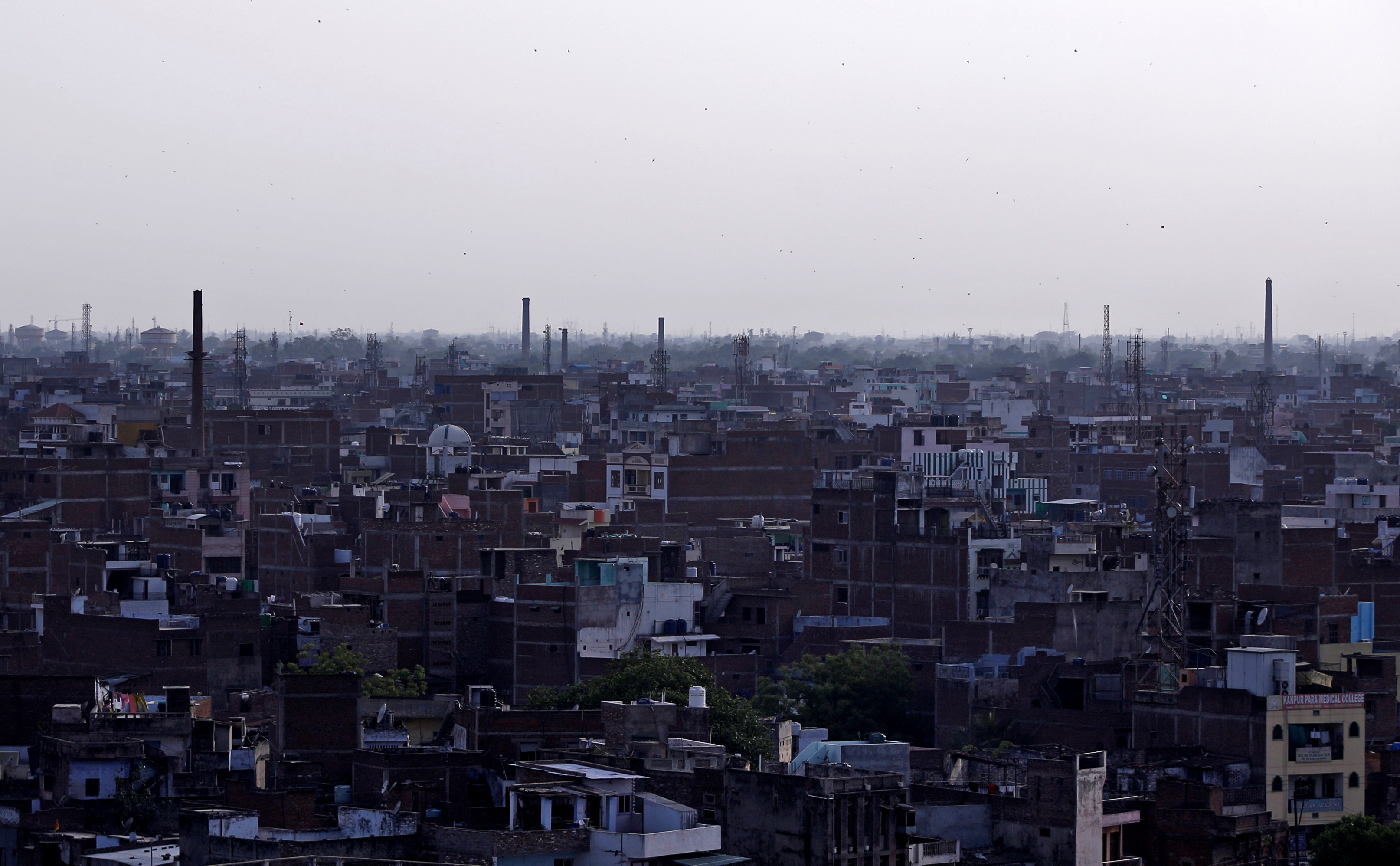 Chimneys of leather tanneries are seen in Kanpur