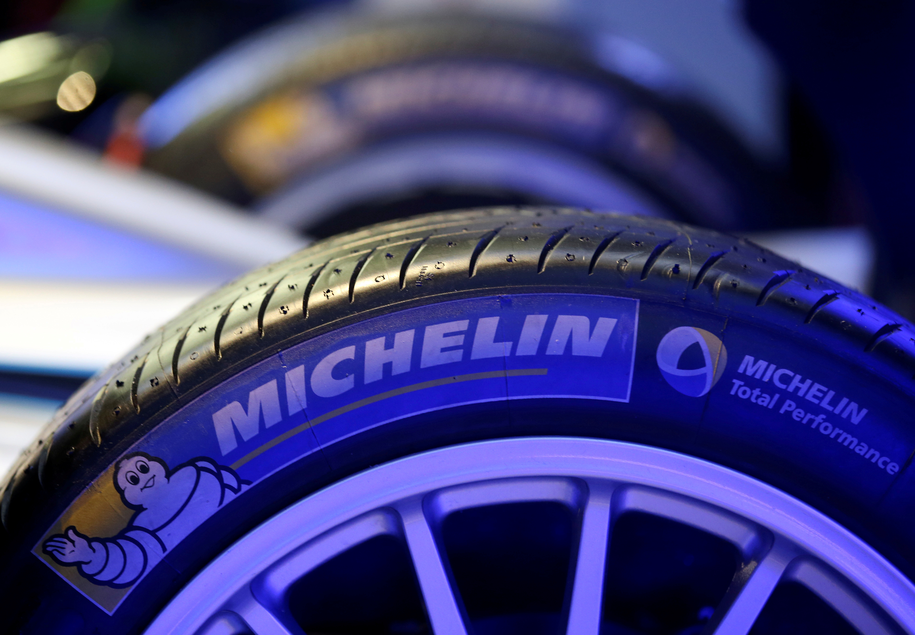 The logo of French tyre maker Michelin on a Formula E racing car tyre
