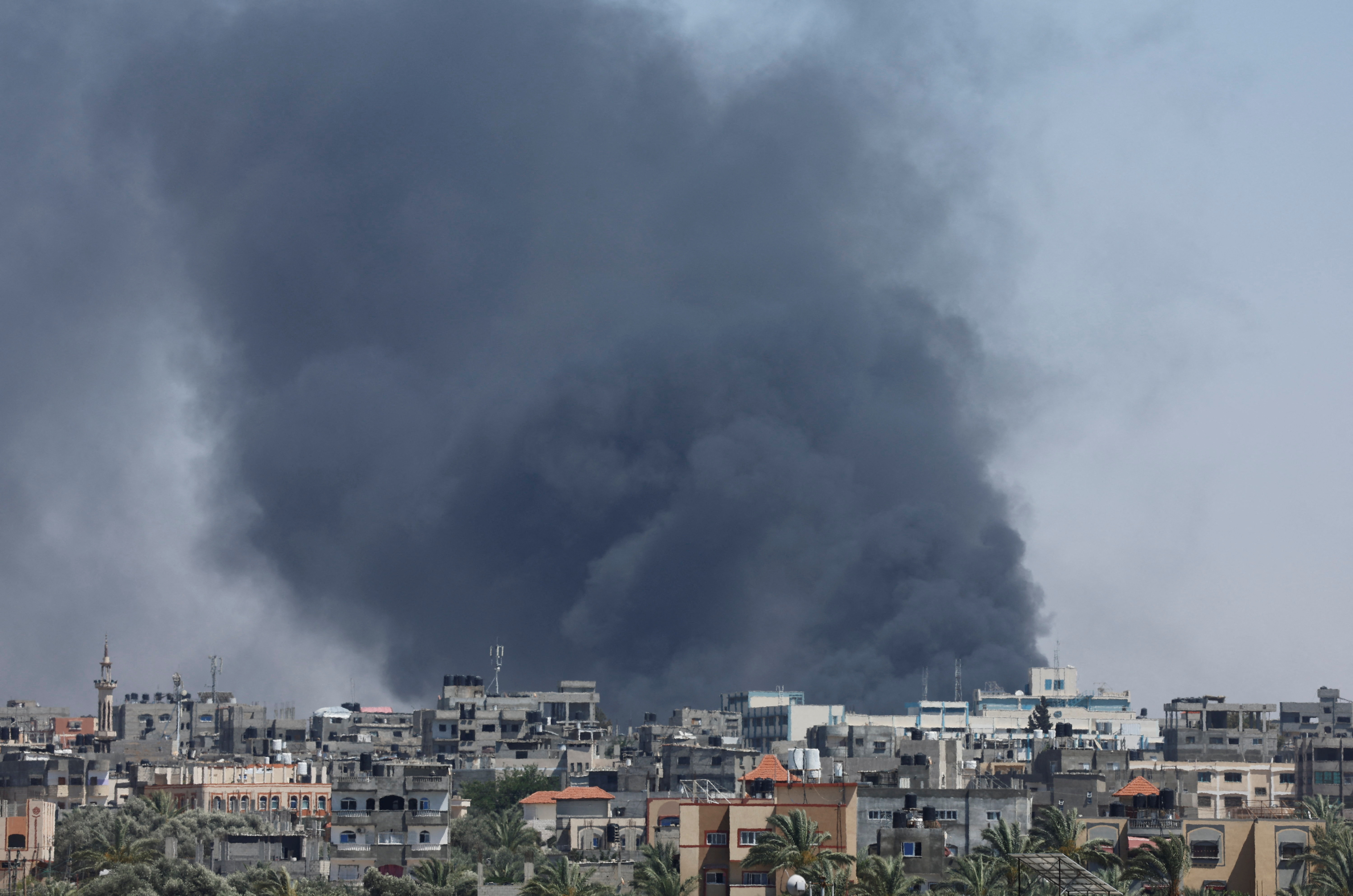 Smoke rises during an Israeli air strike, in Rafah
