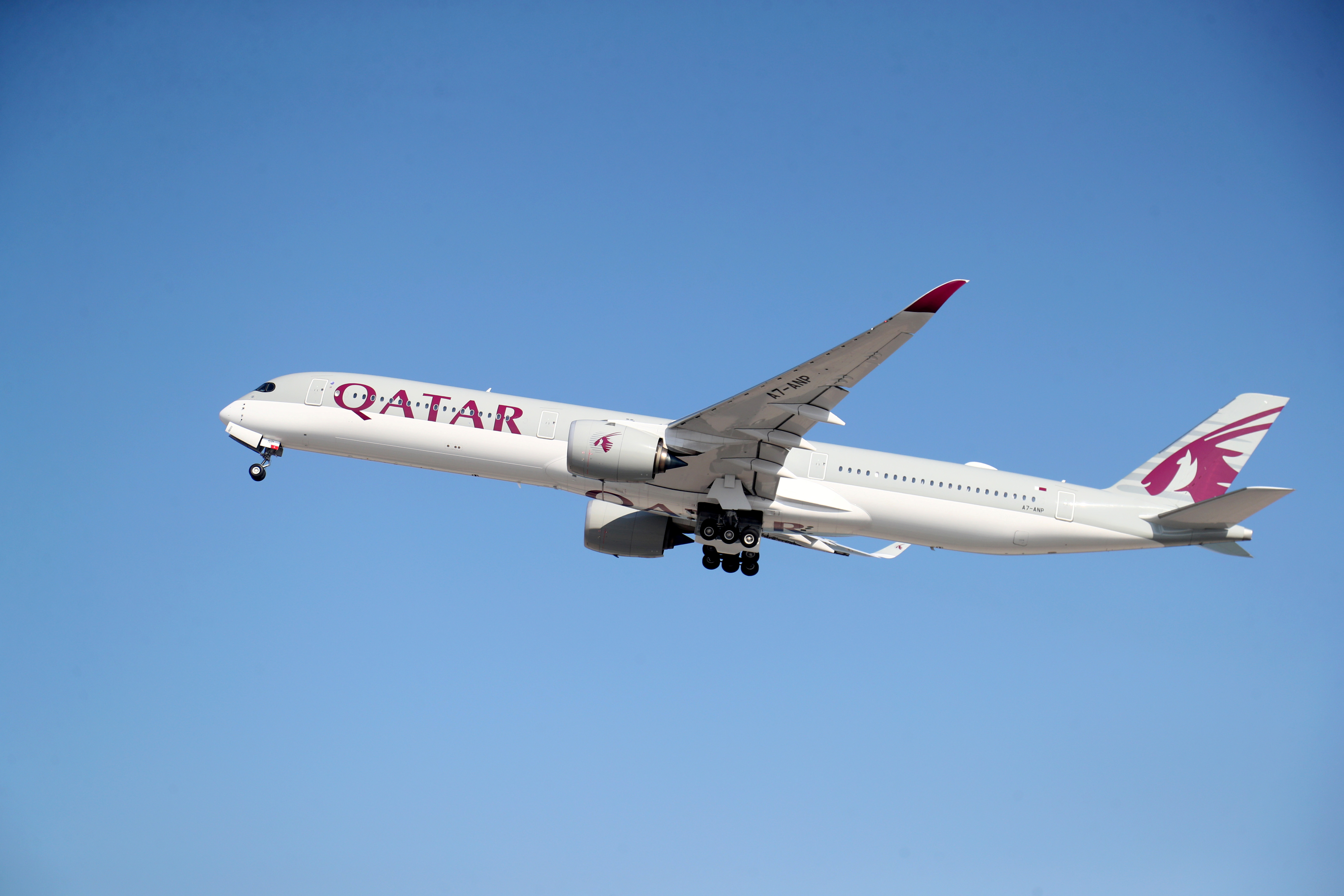 A Qatar Airways plane takes off at Hamad International Airport in Doha