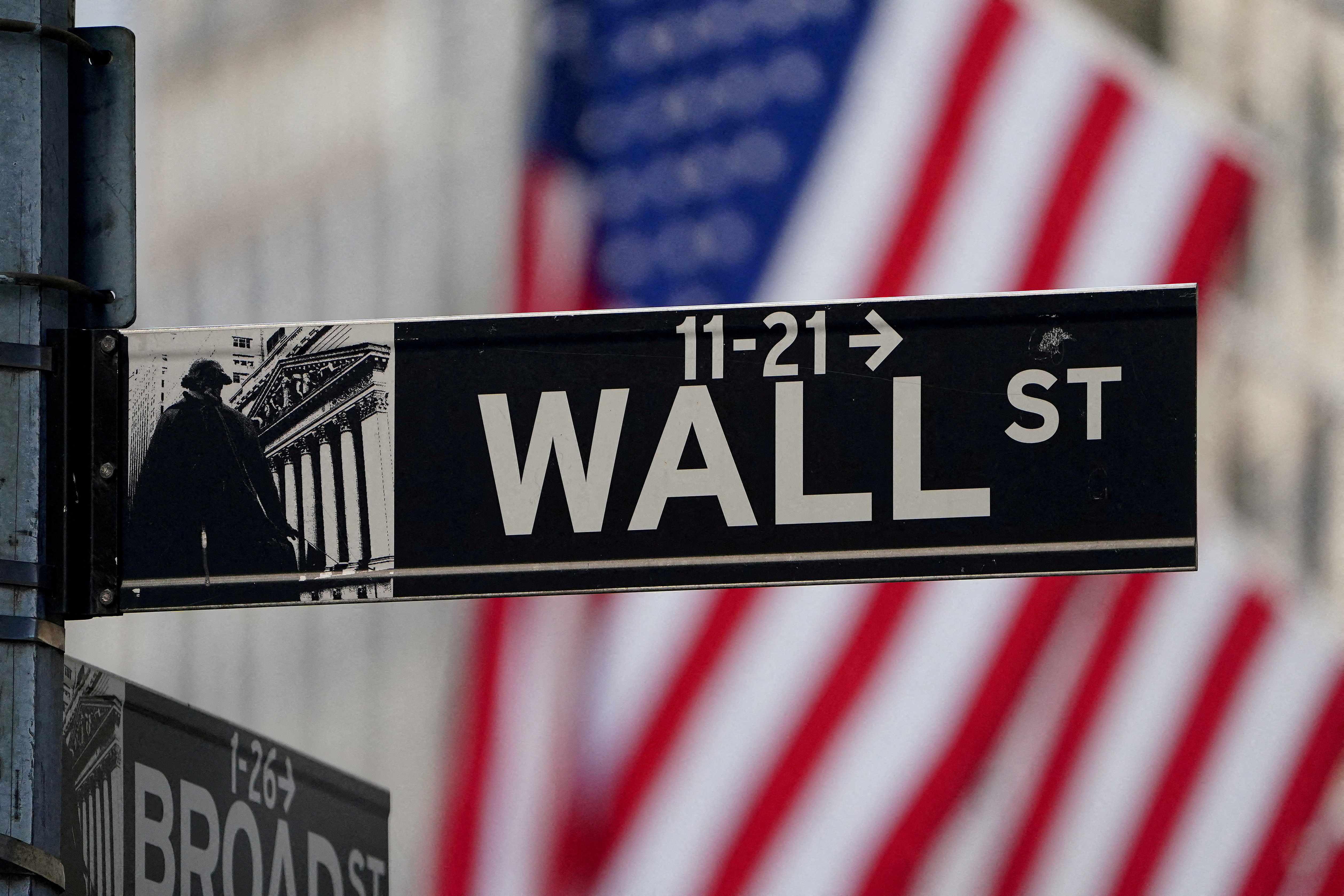 The Wall Street sign is pictured at the New York Stock exchange (NYSE) in New York City, United States