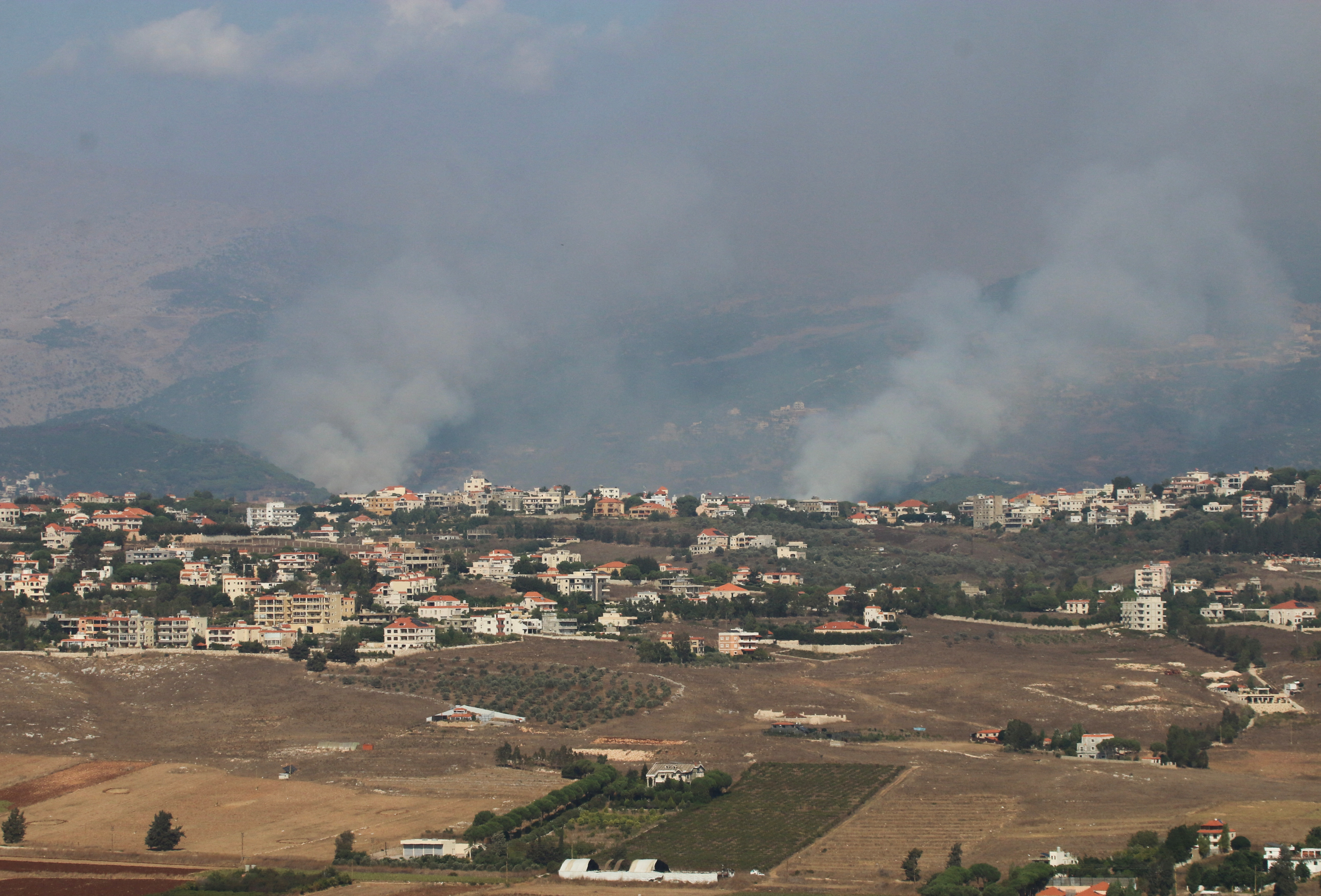 Smoke rises from Kfarhamam, amid cross-border hostilities between Hezbollah and Israeli forces, as pictured from Marjayoun