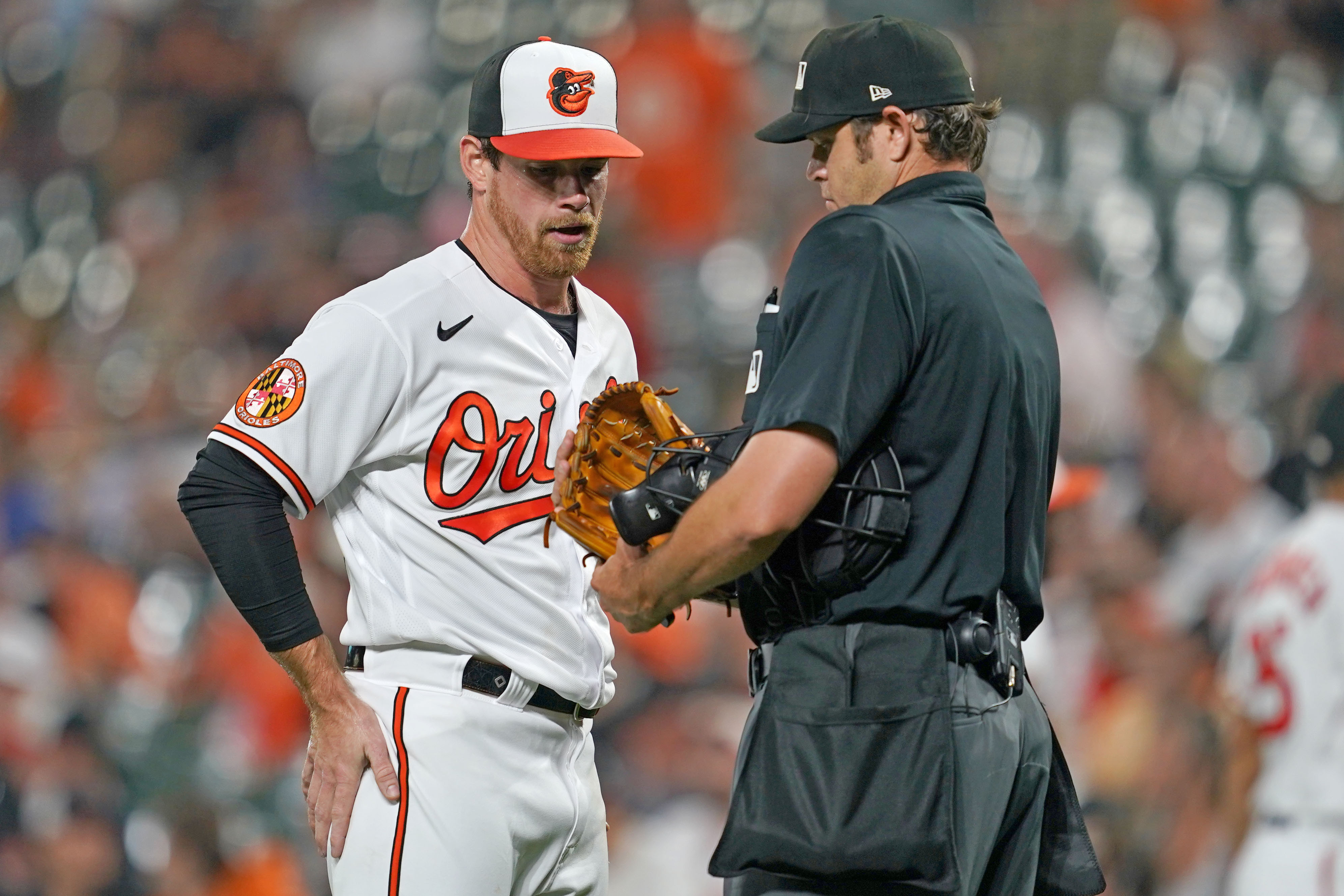 Orioles emerge with soggy win over Reds