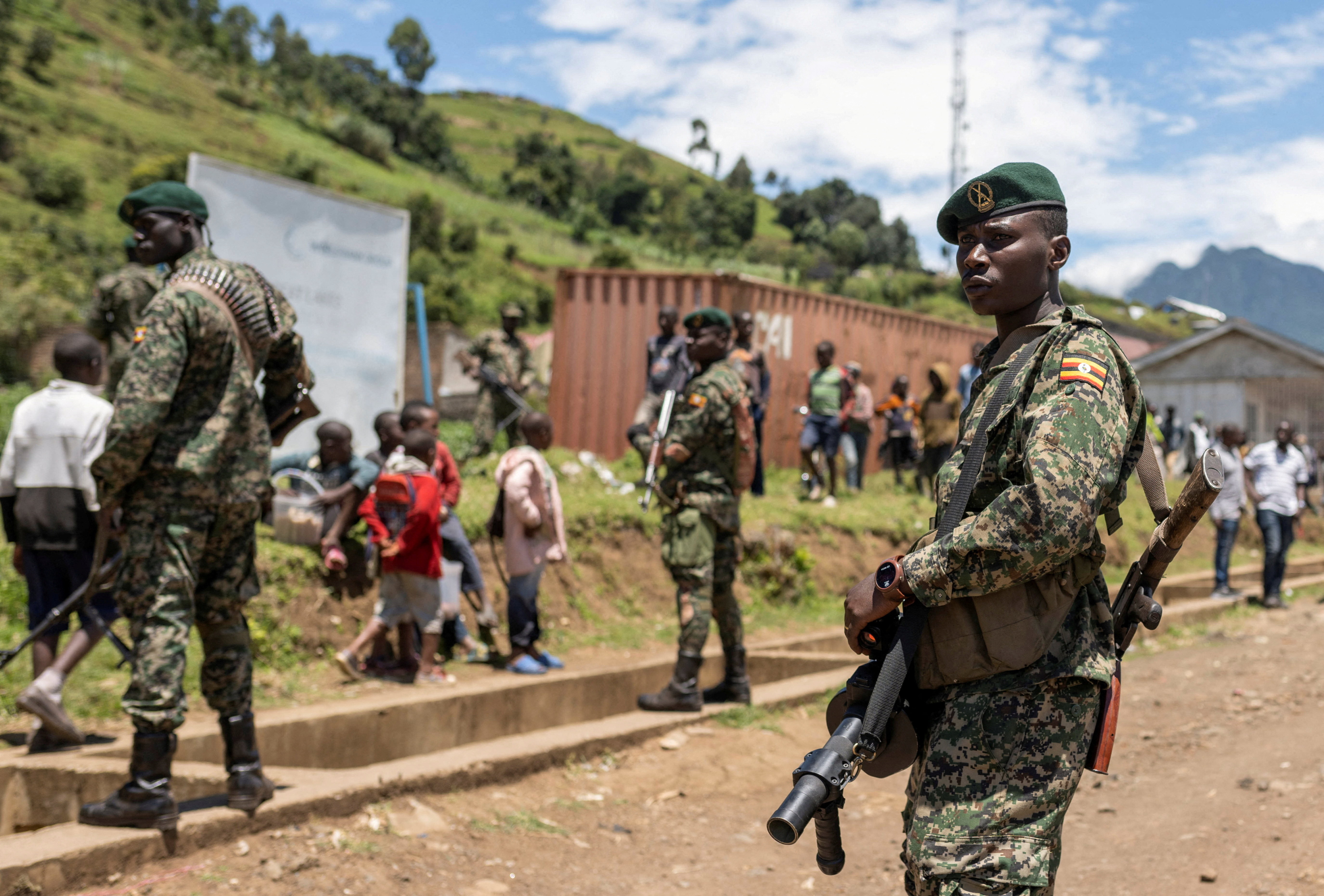 Members of the Ugandan army, part of the troops to the EACRF, patrol a settlement ceded by M23 rebels fighters in Bunagana