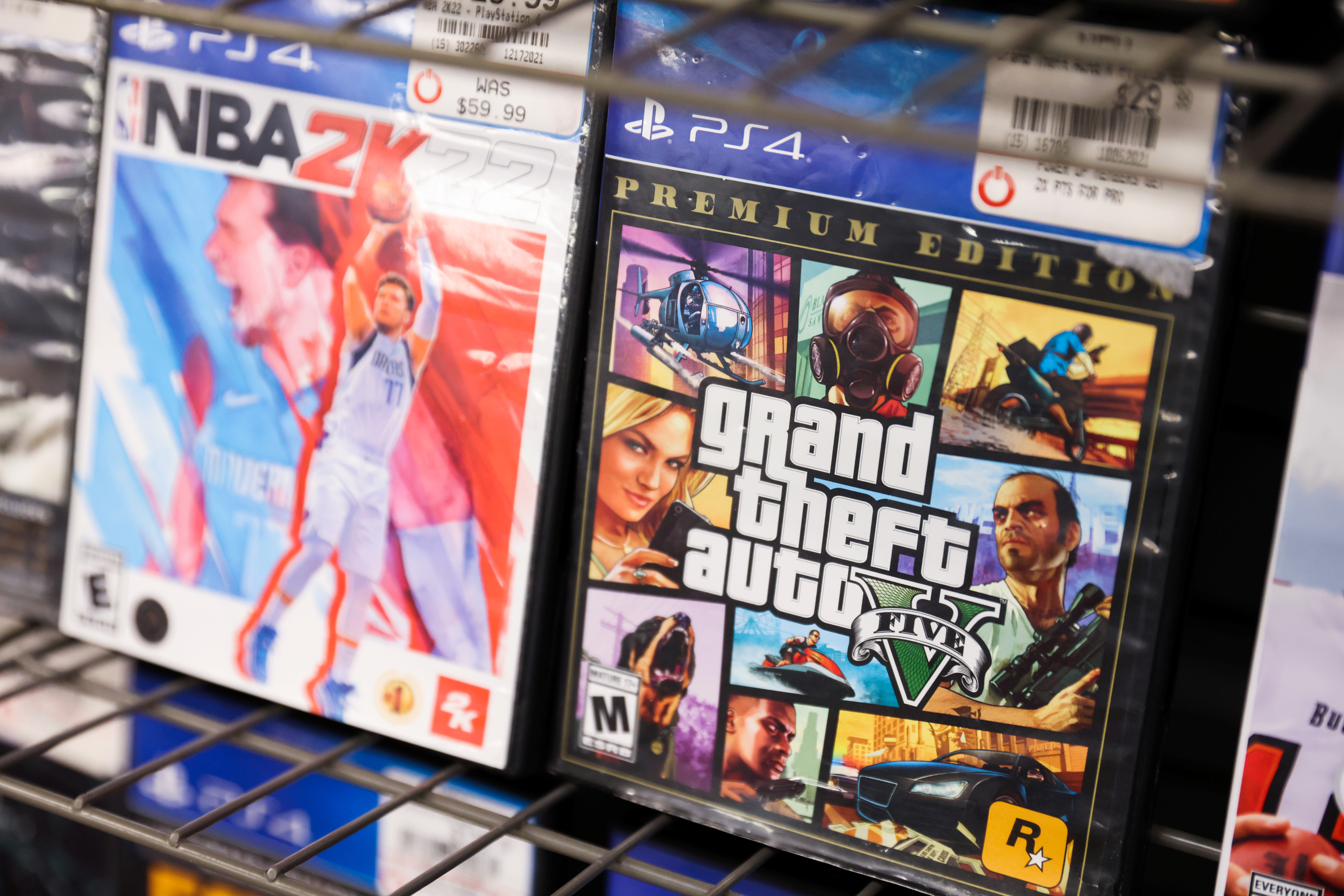 NBA 2K22 and Grand Theft Auto 5 by Take-Two Interactive Software Inc are seen for sale in a store in Manhattan, New York City
