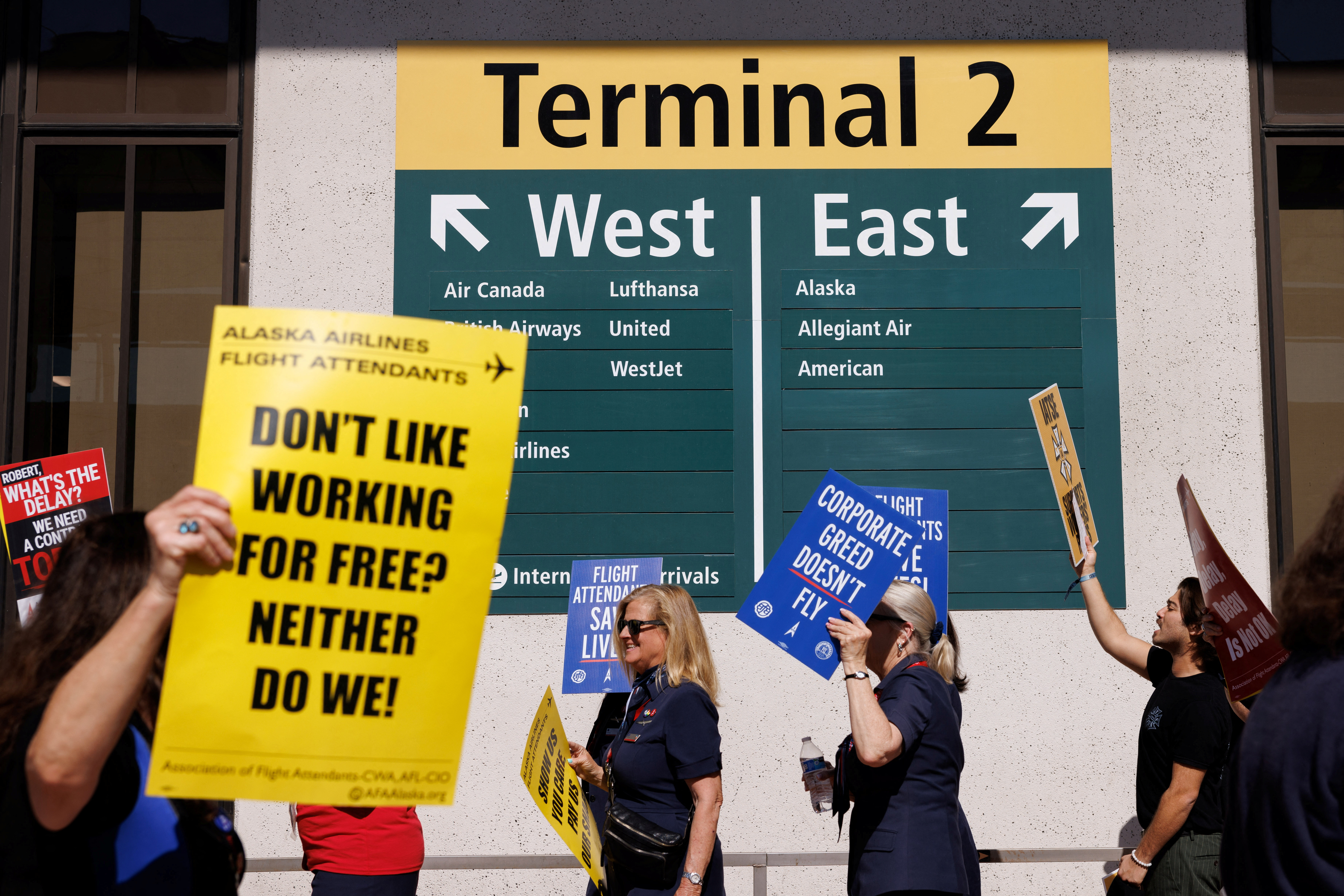 Alaska Air flight attendants authorize strike for first time in three  decades