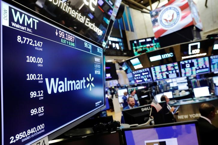 A Walmart logo is displayed above the floor of the New York Stock Exchange shortly after the opening bell in New York