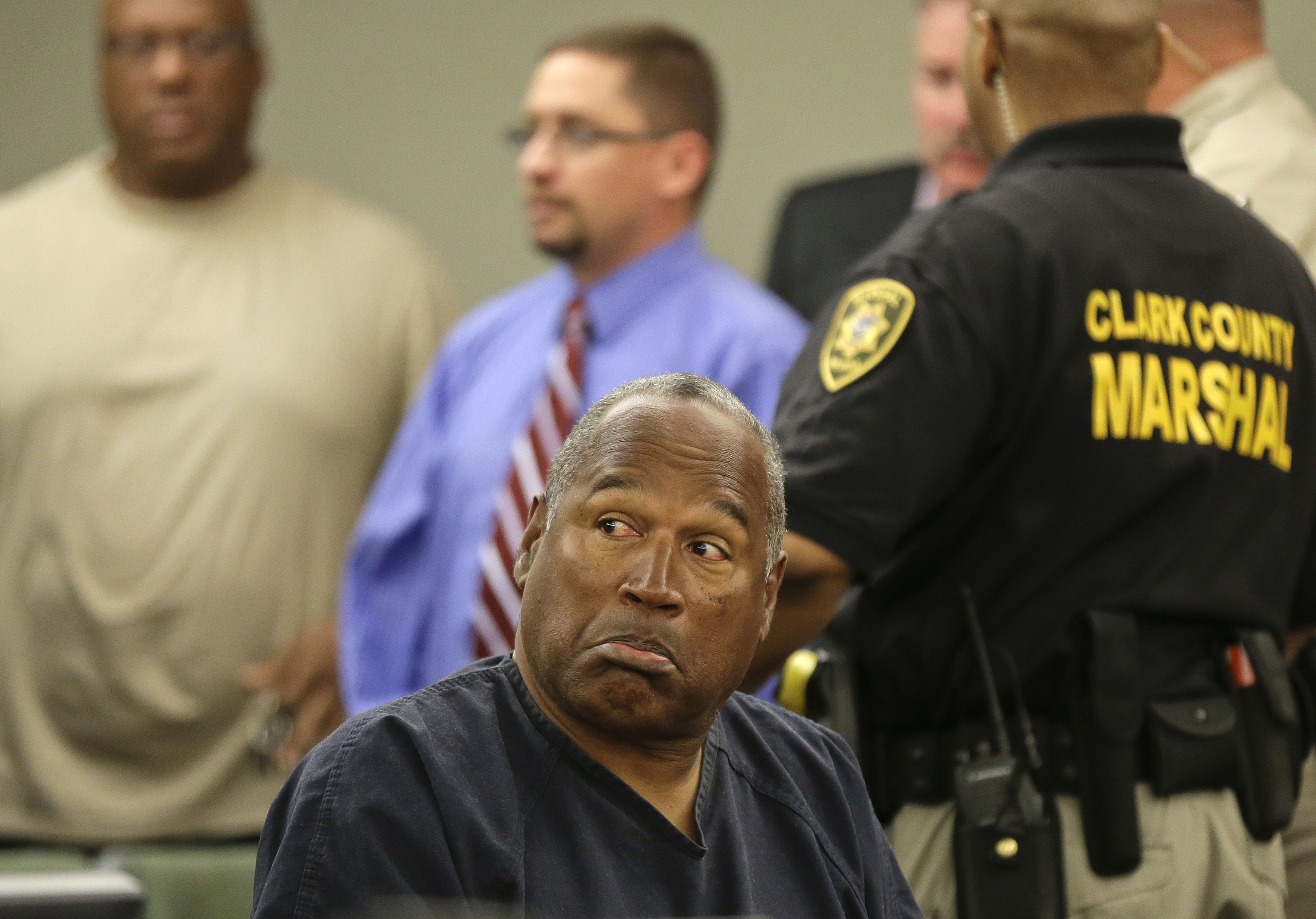  O.J. Simpson reacts after speaking to his attorneys in Clark County District Court in Las Vegas, Nevada