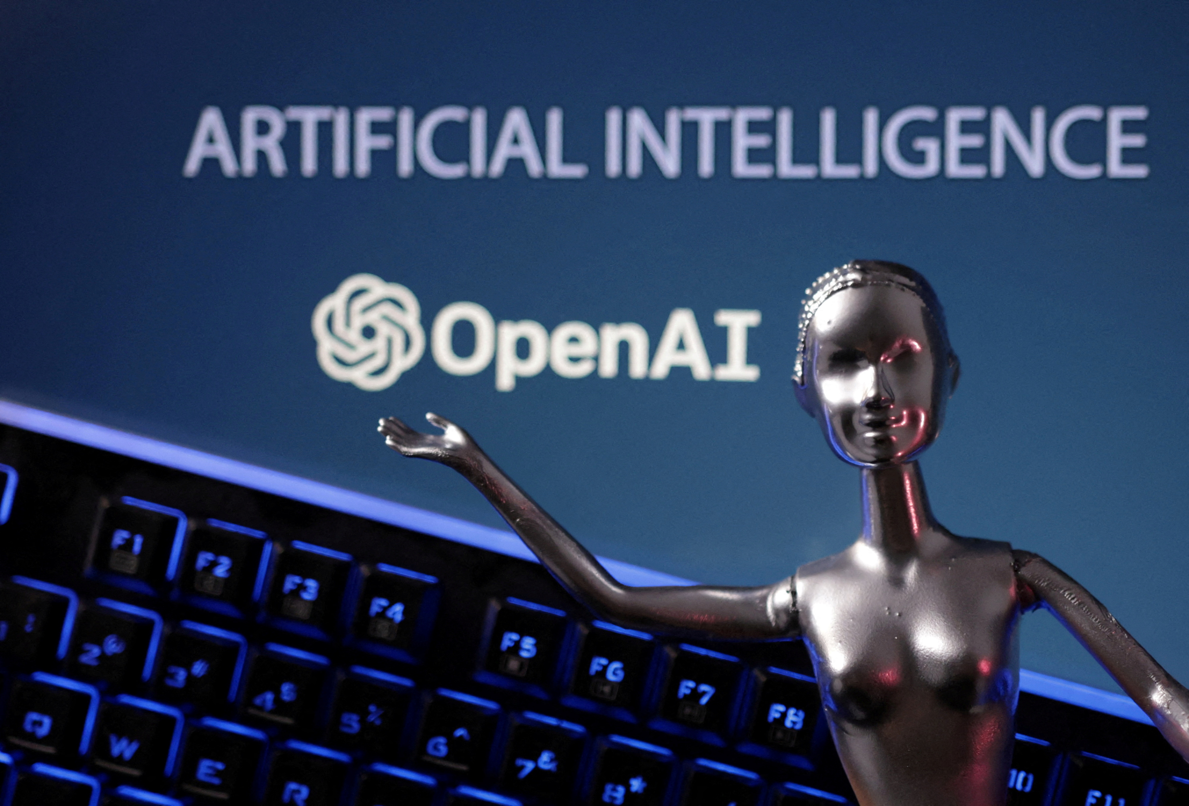 Illustration shows OpenAI logo and AI Artificial Intelligence words