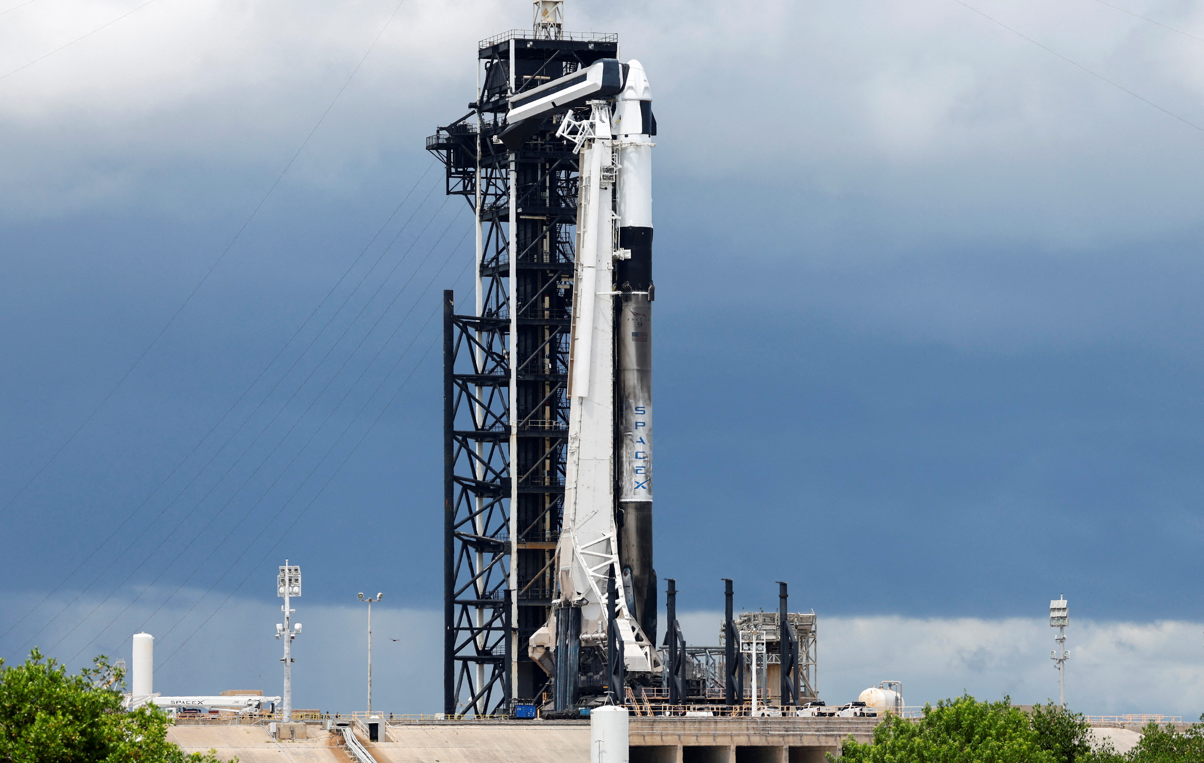 A SpaceX Falcon 9 rocket is prepared for launch of Polaris Dawn, a private human spaceflight mission, at the Kennedy Space Center in Cape Canaveral