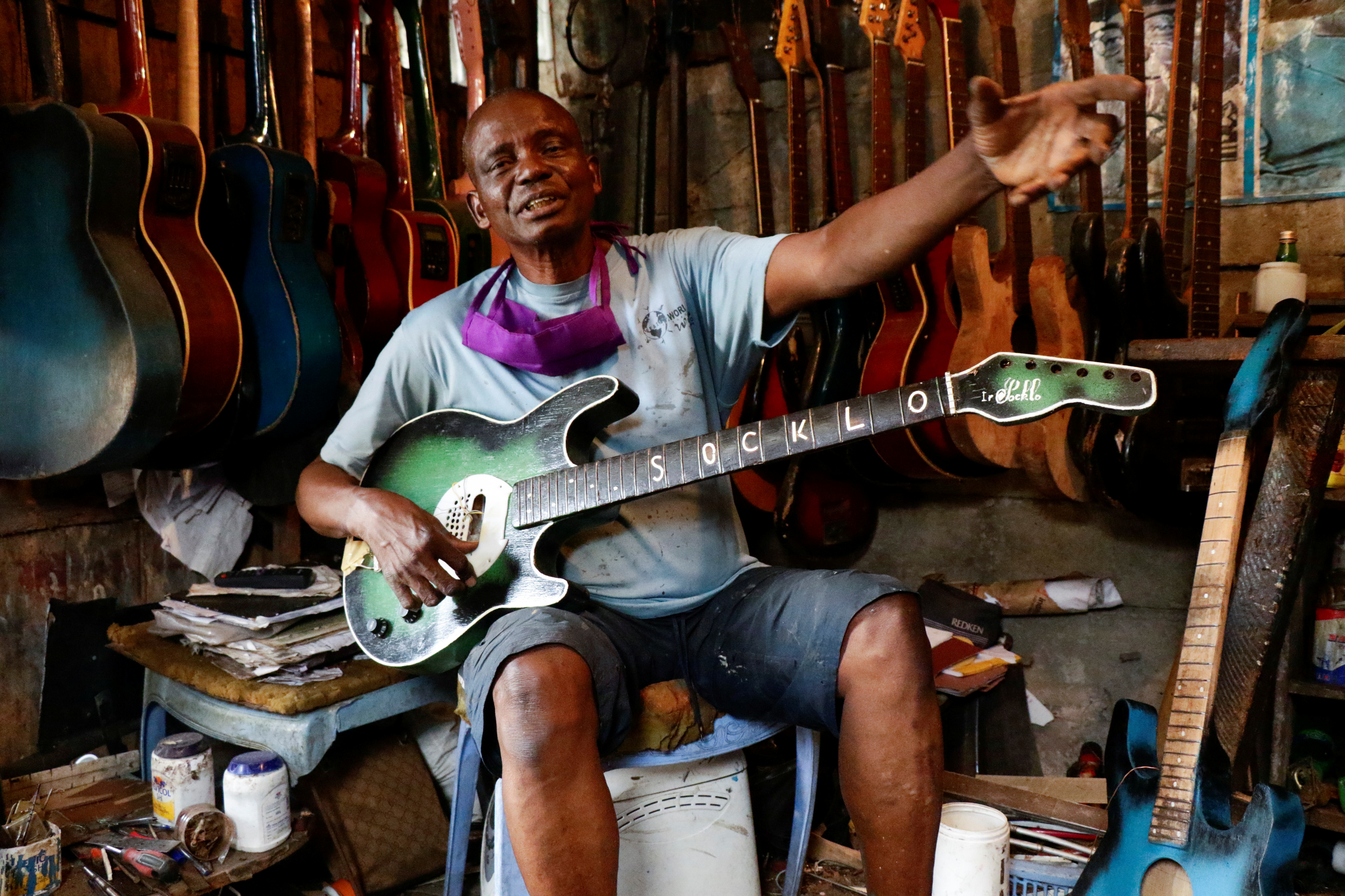 born Scrutinize Because Congo's self-taught guitarmaker caters to the stars | Reuters