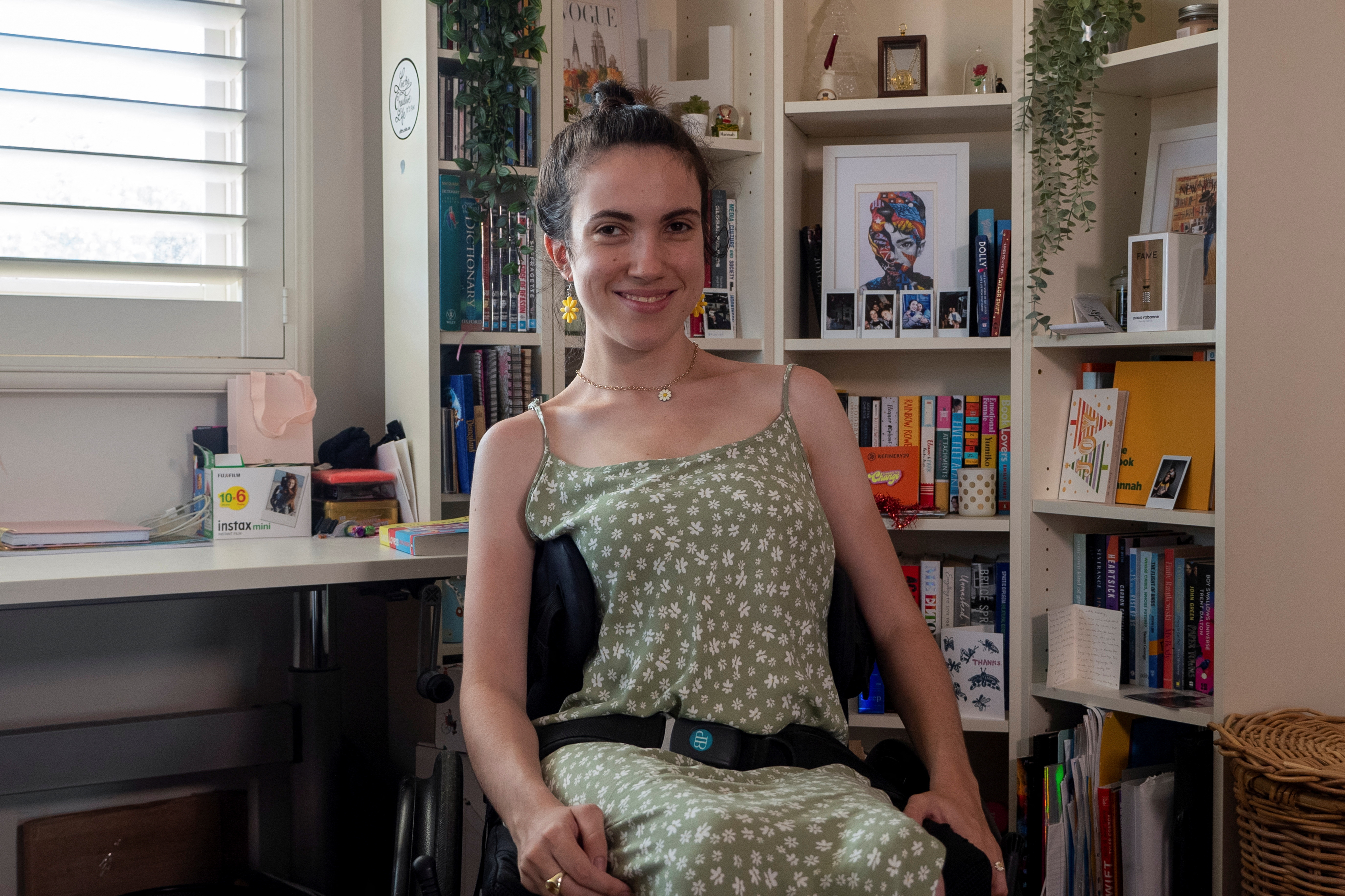 Disability advocate Diviney sits at her home in Sydney