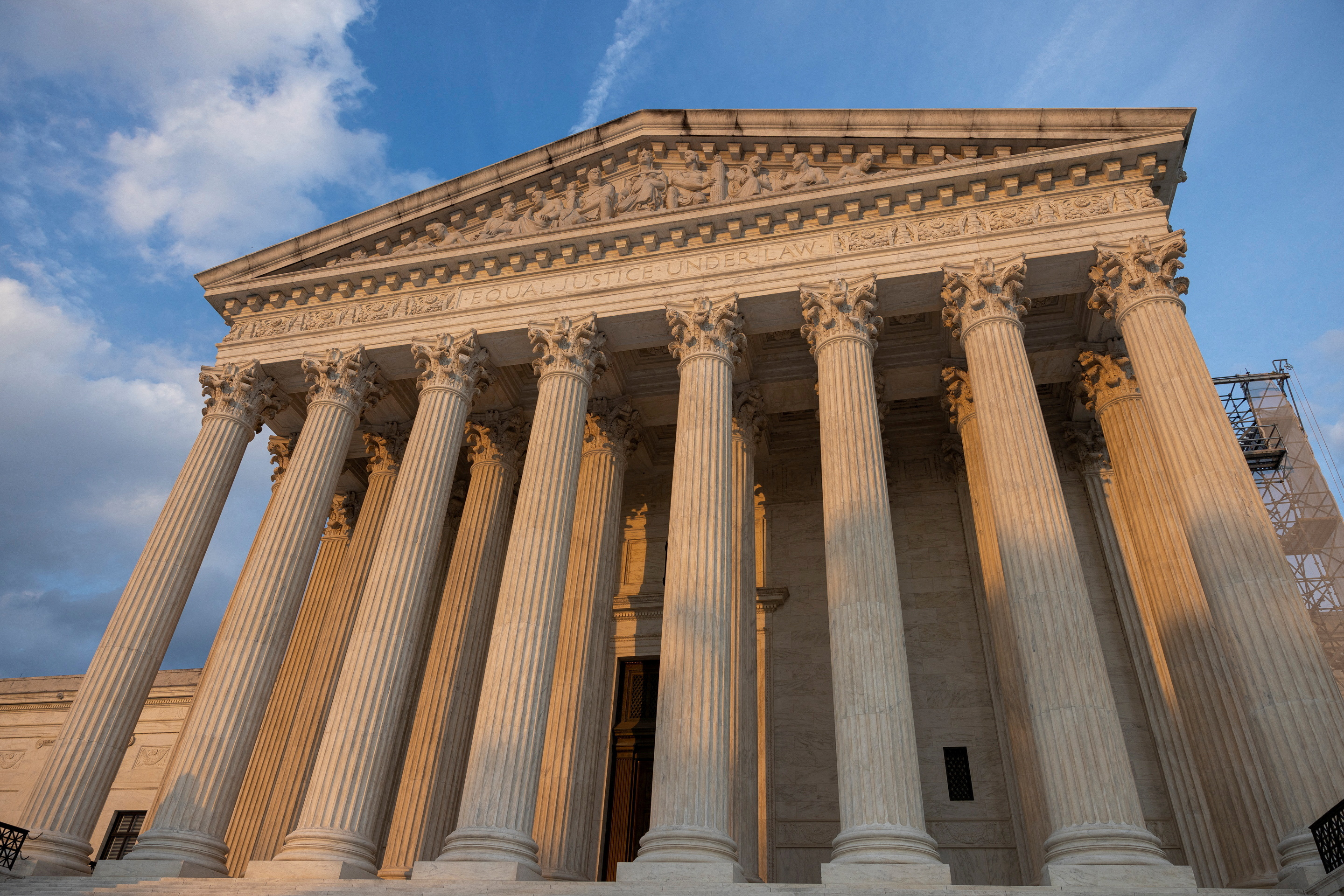 Panoramic exterior shot of the imposing white marble US Supreme Court building in Washington, DC