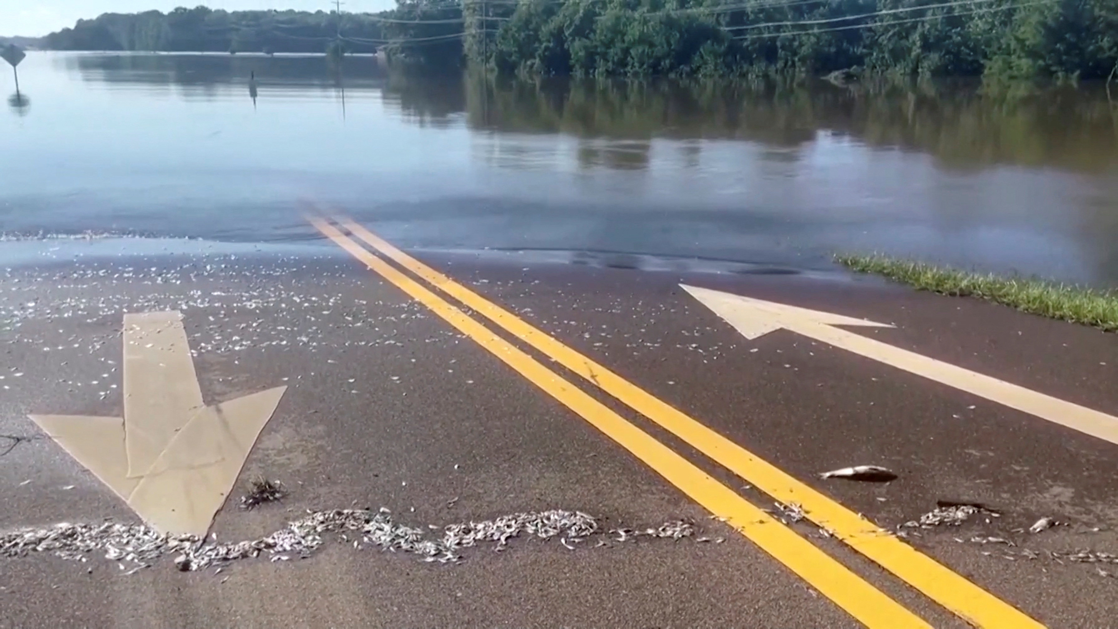 otFlood waters in Mississippi cover roads and fields