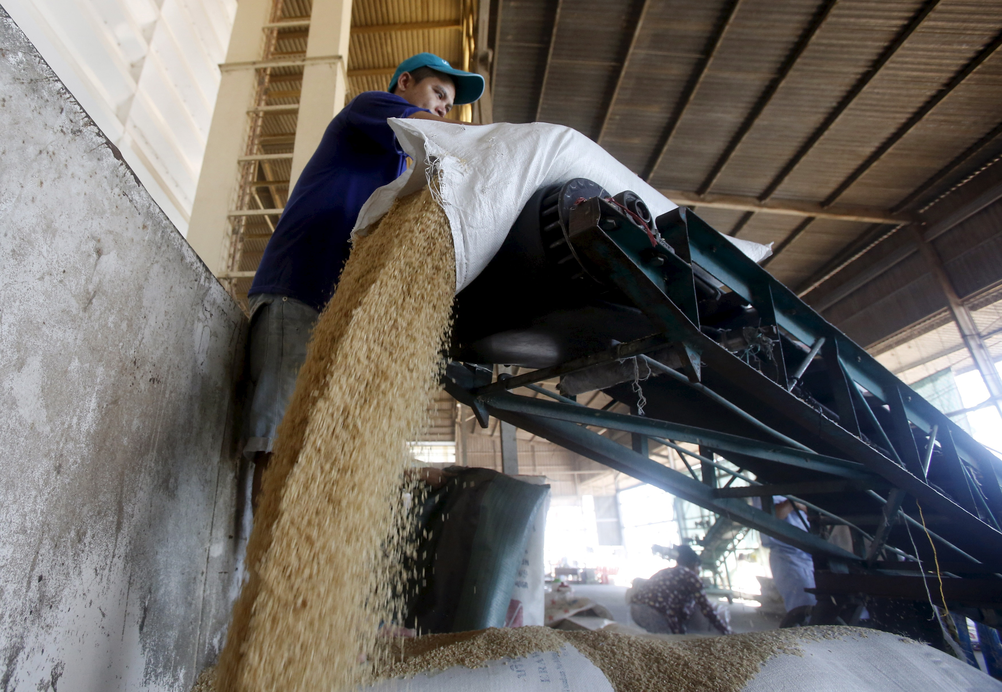 A man works at a rice processing factory in Vietnam's southern Mekong delta city of Can Tho