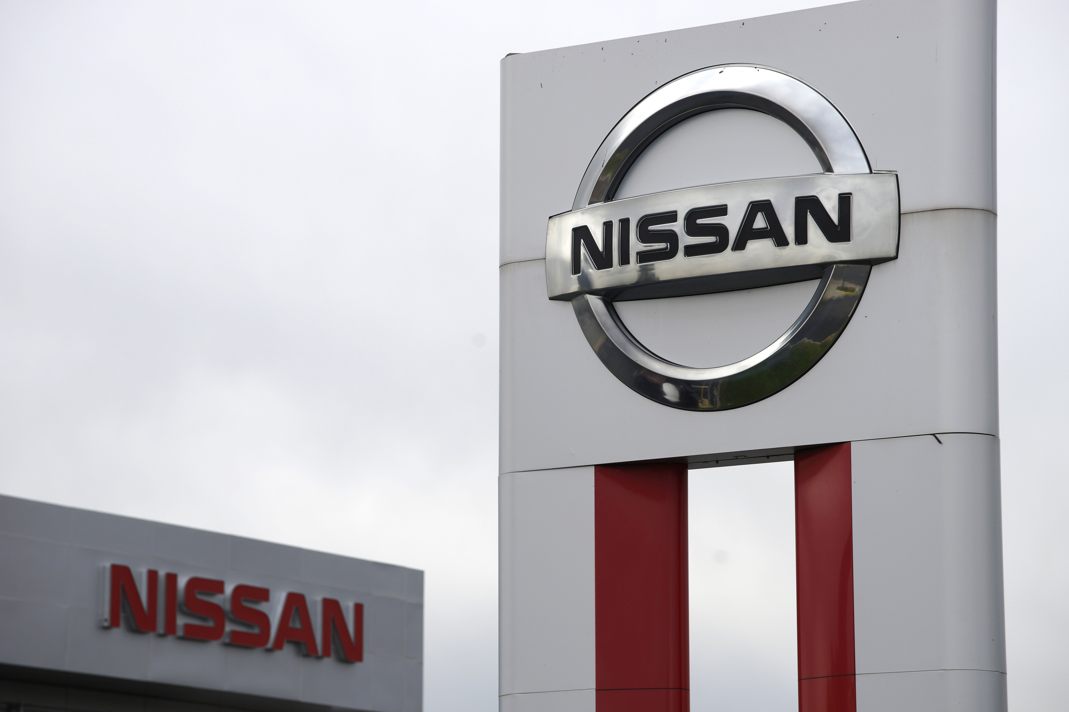 Nissan signs are seen outside a Nissan auto dealer in Broomfield, Colorado
