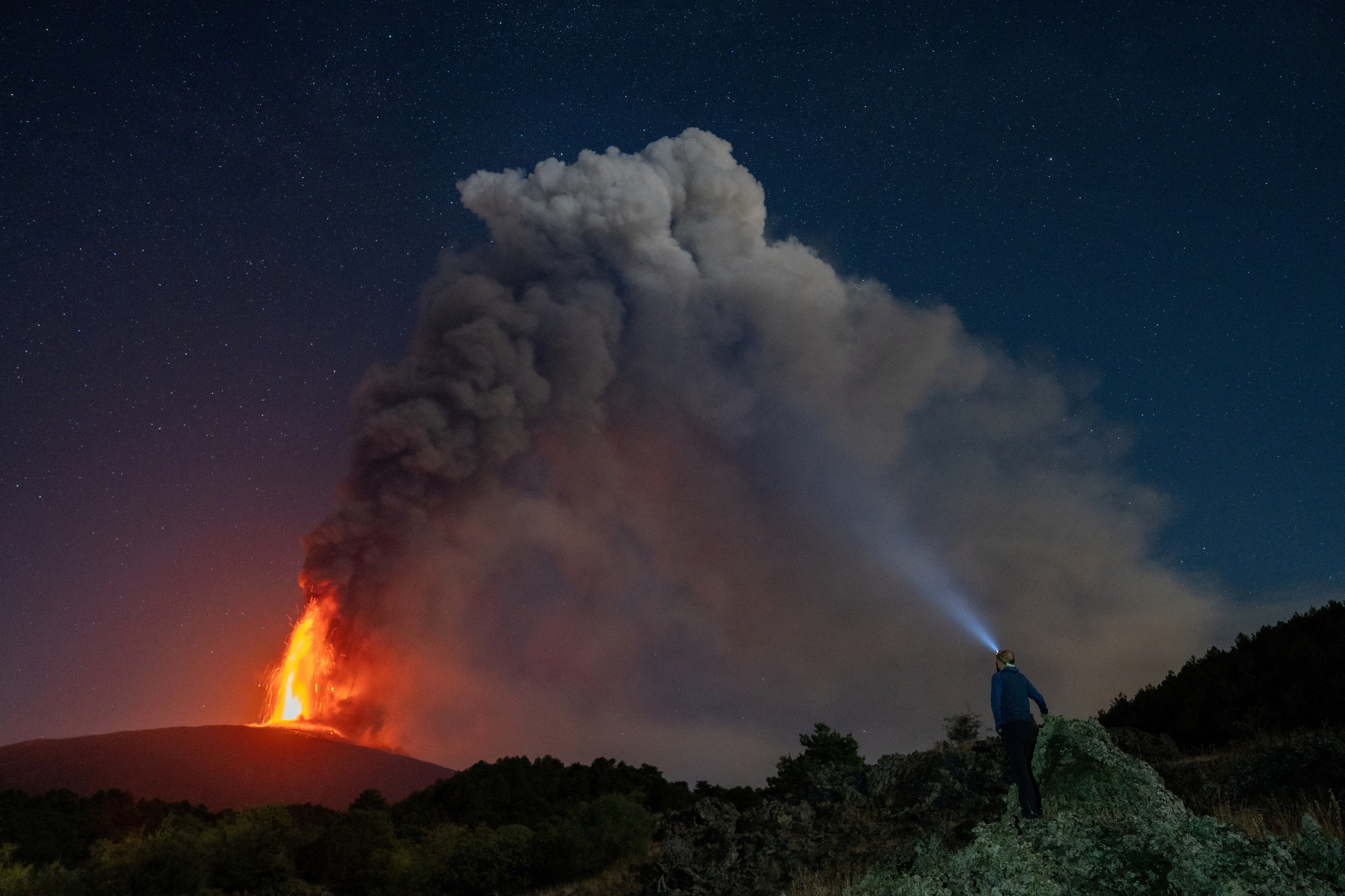 Lava and ash spew from Italy s Mount Etna volcano July 18 2024 Reuters