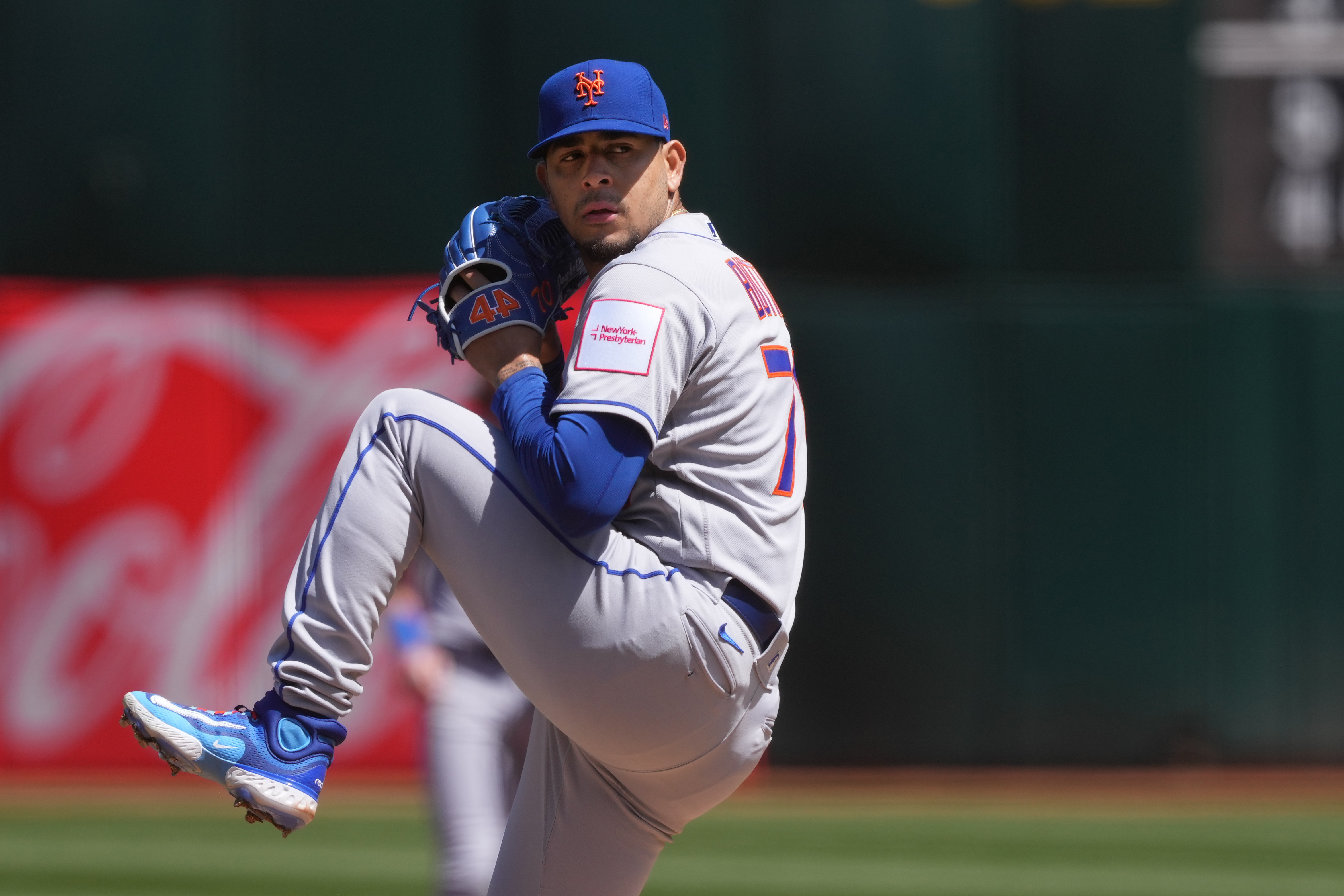 New York Mets Eduardo Escobar wears a New York Presbyterian