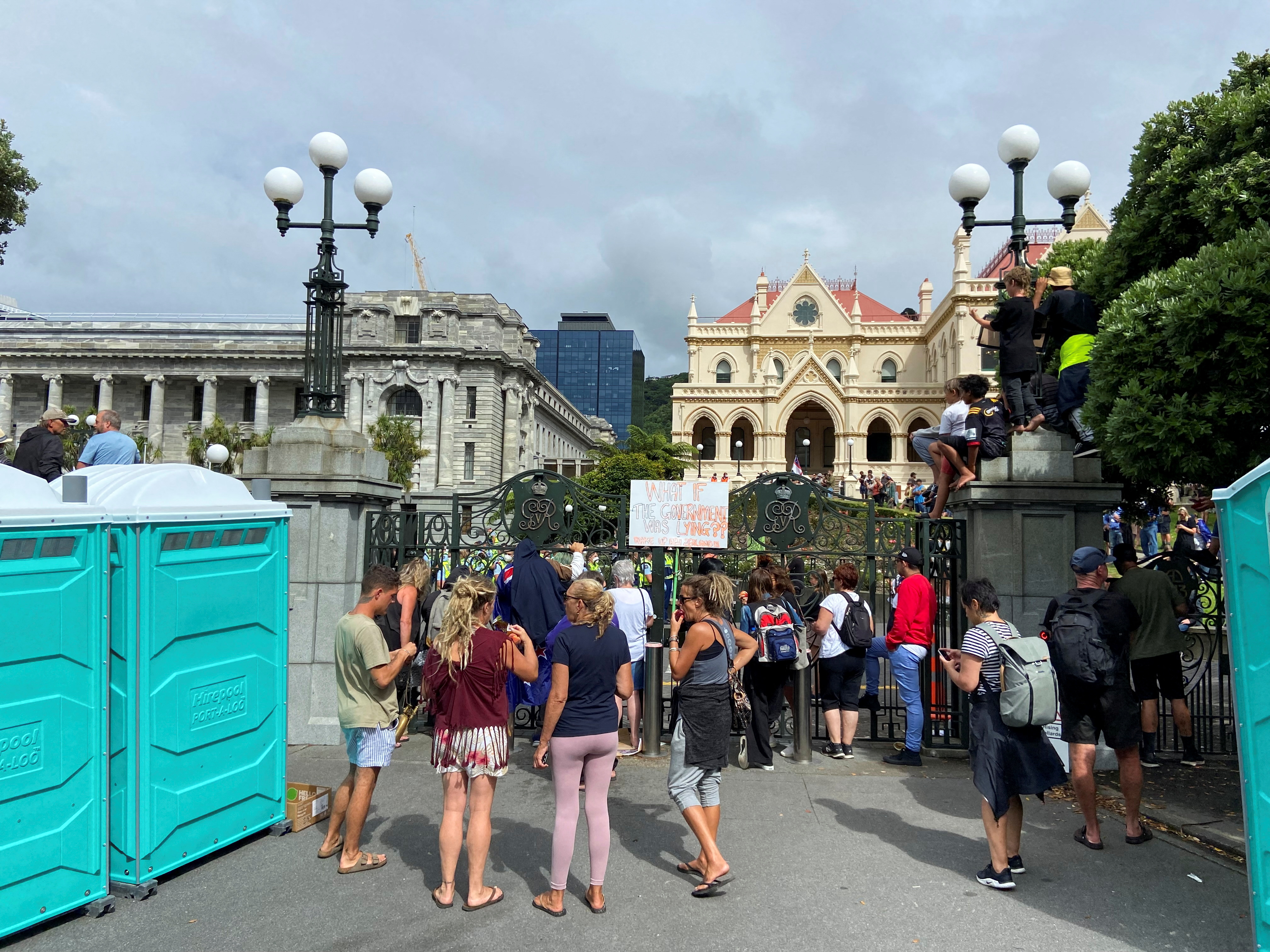 Anti-vaccine mandate protesters gather to demonstrate in front of the parliament, in Wellington