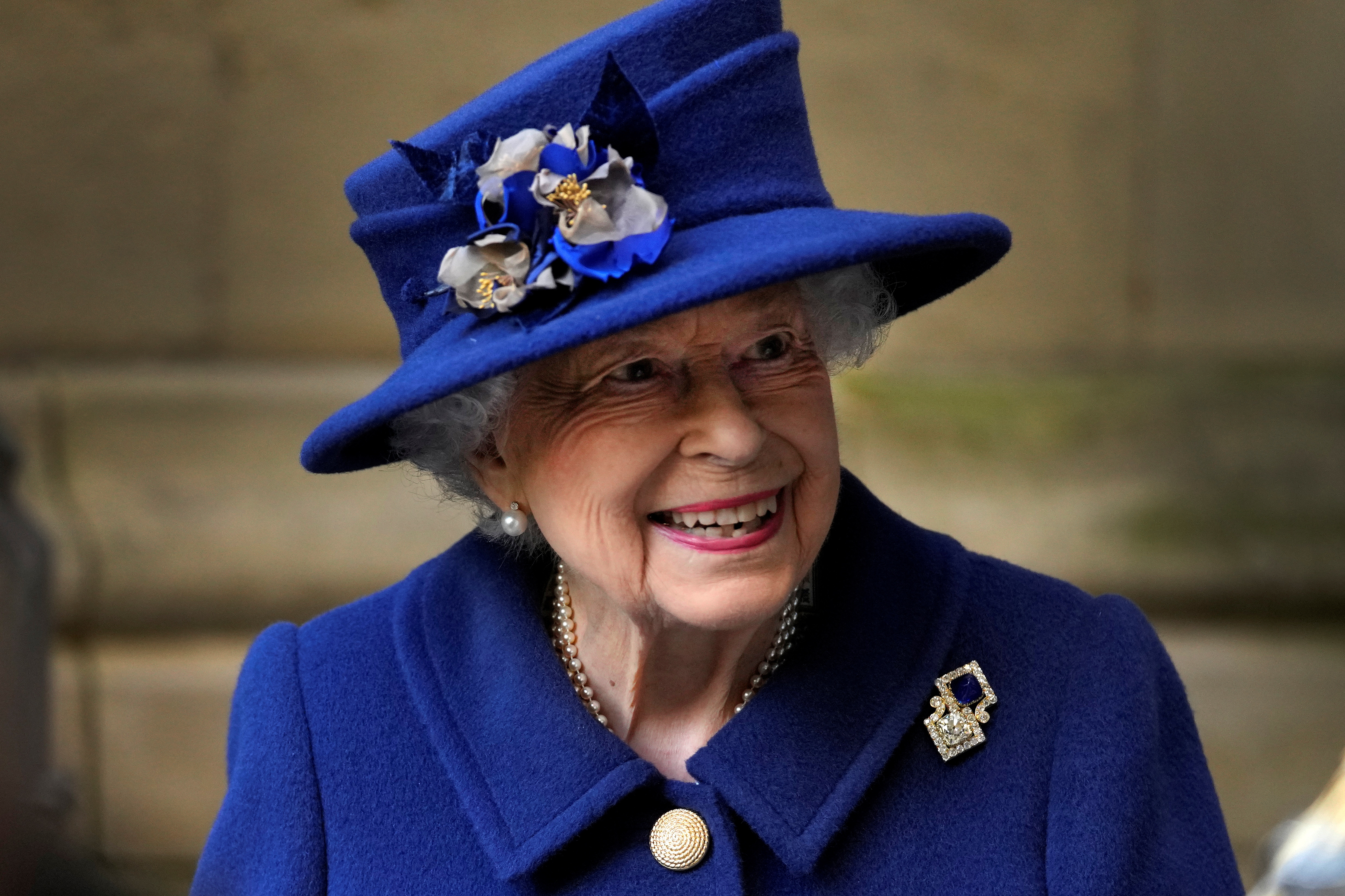 Britain's Queen Elizabeth leaves after a Service of Thanksgiving to mark the Centenary of the Royal British Legion at Westminster Abbey, London, Britain October 12, 2021. Frank Augstein/Pool via REUTERS