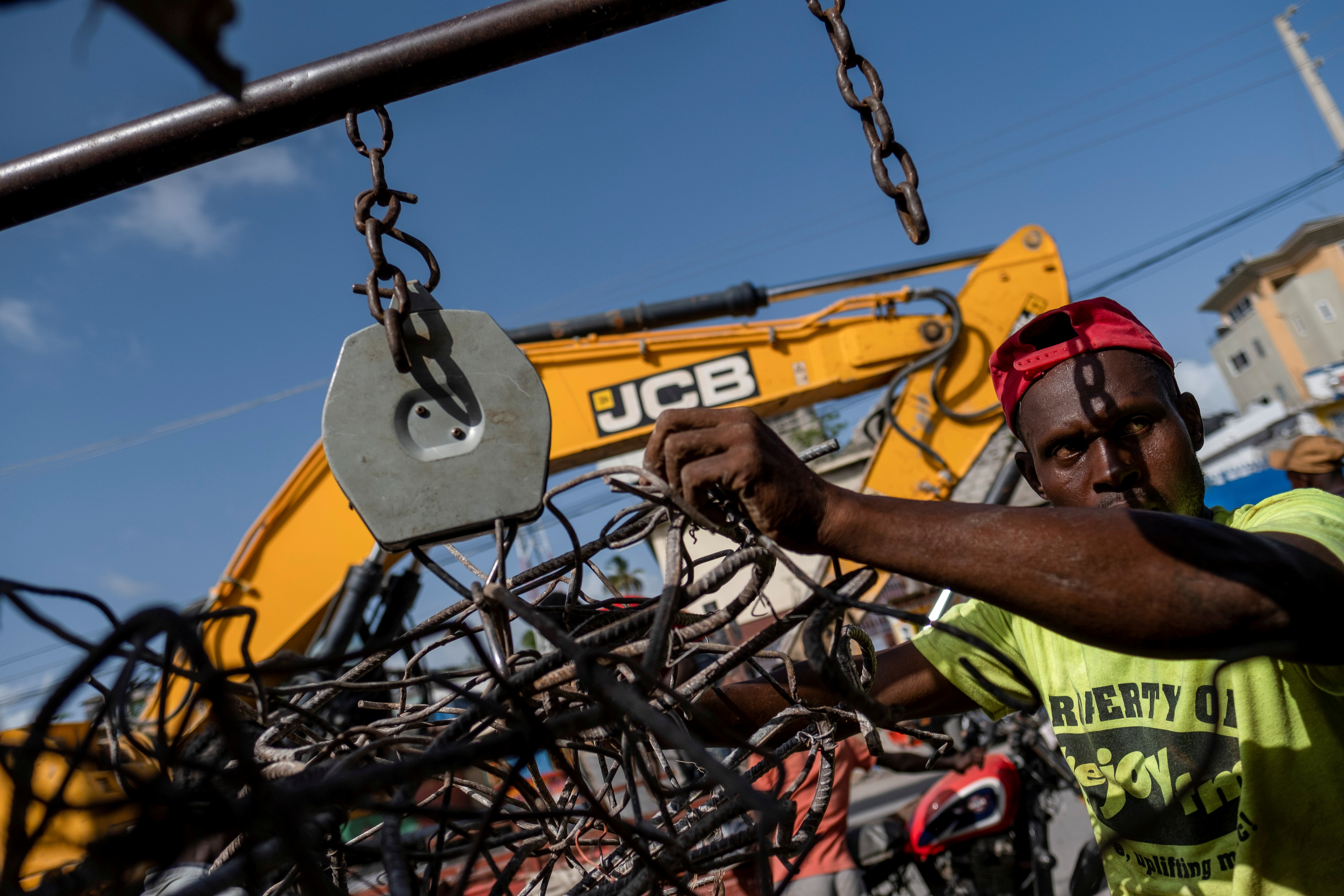 Scrap metal recycling brings cash in Haiti post-earthquake