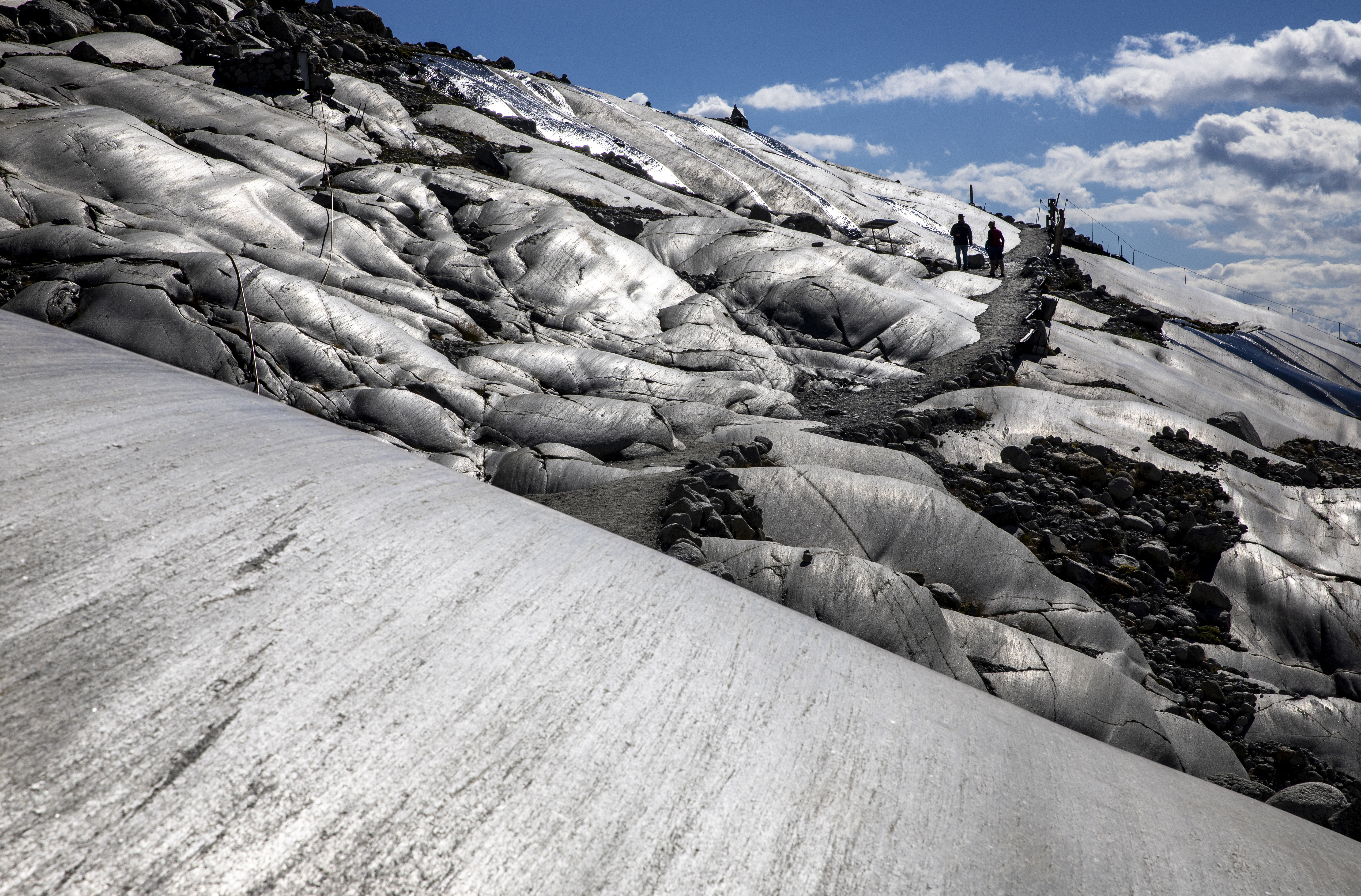 A view shows polished rocks after the glacier melted at the Rhone glacier in Obergoms