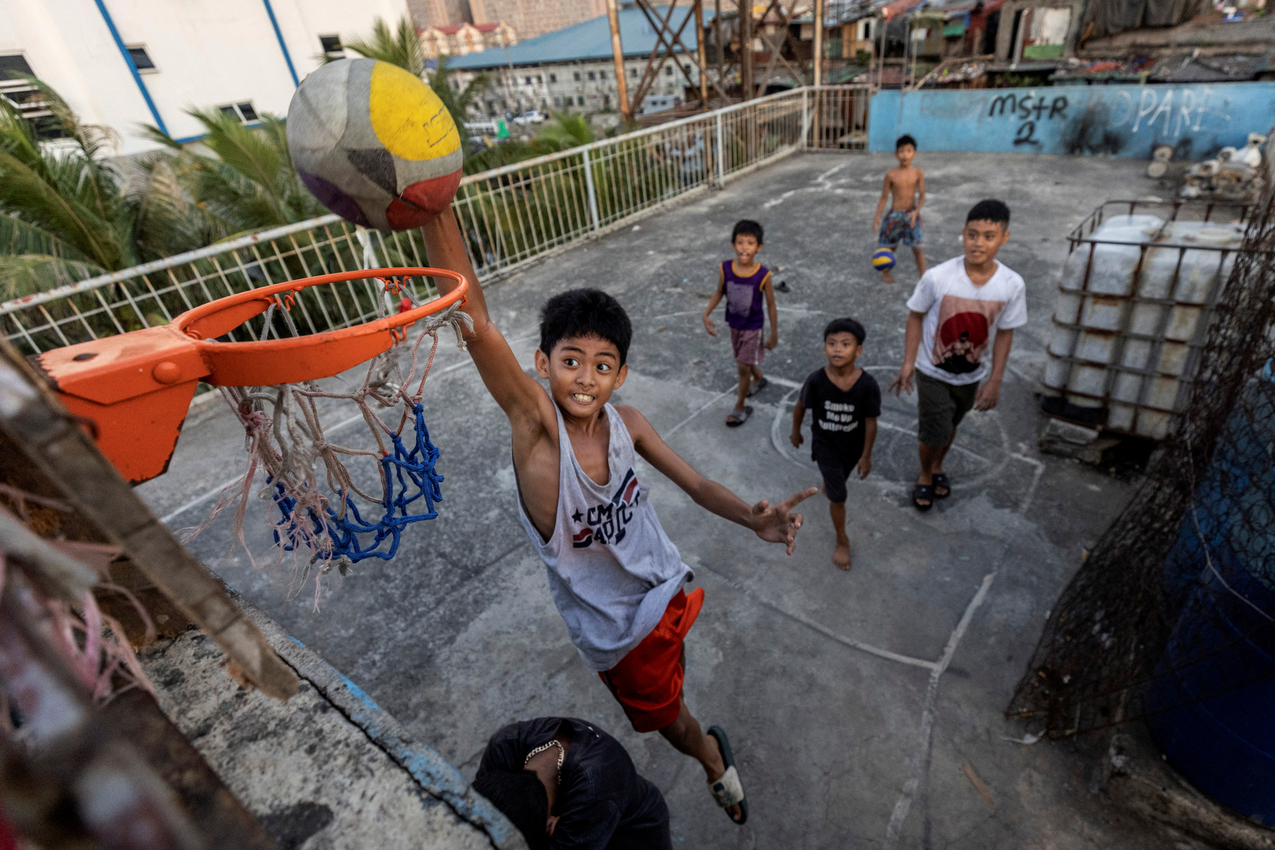 The Wider Image: In FIBA World Cup host Philippines, basketball is life