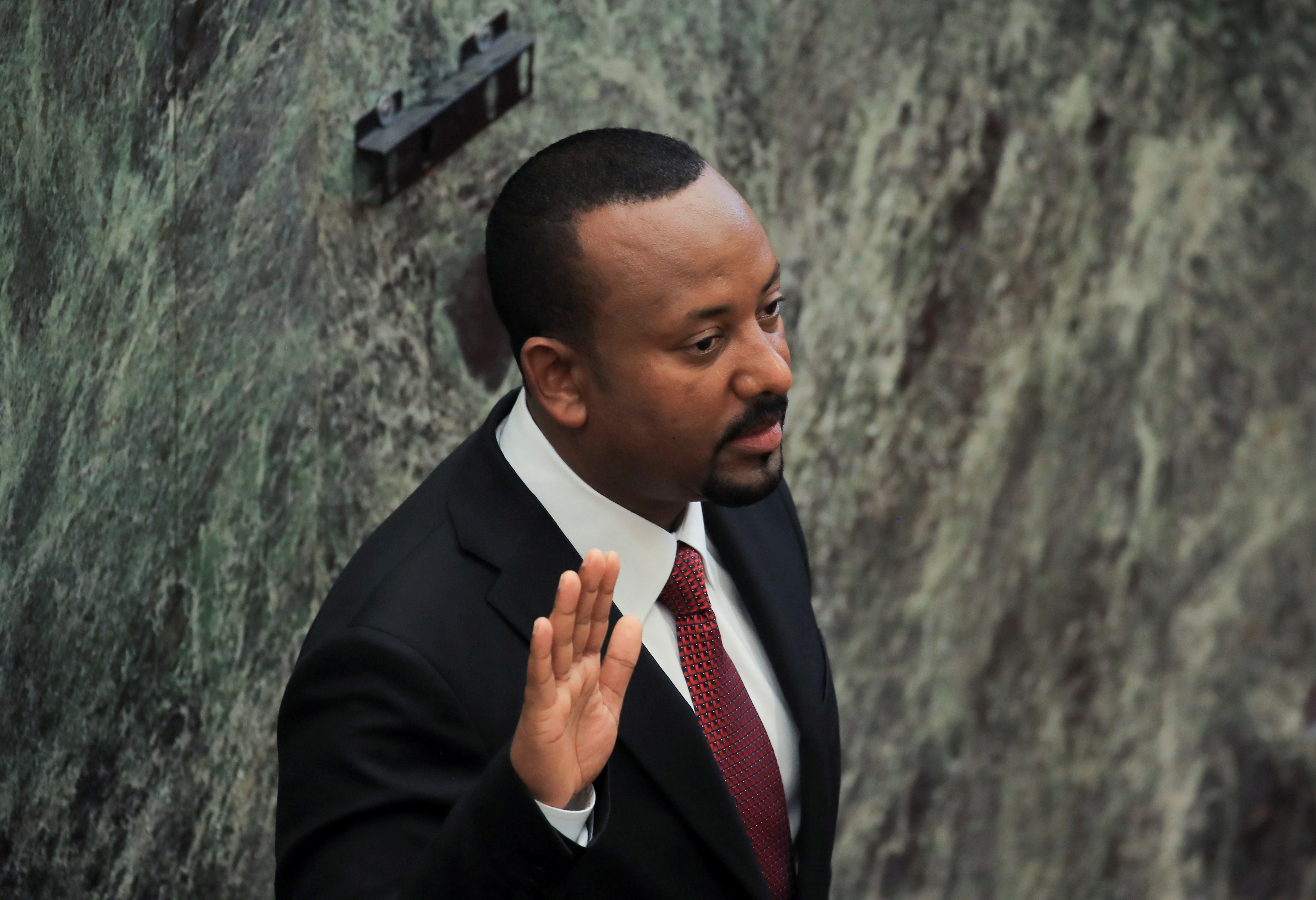  Ethiopia's Prime Minister Abiy Ahmed takes oath during his incumbent ceremony at the Parliament building in Addis Ababa, Ethiopia October 4, 2021. REUTERS/Tiksa Negeri/File Photo