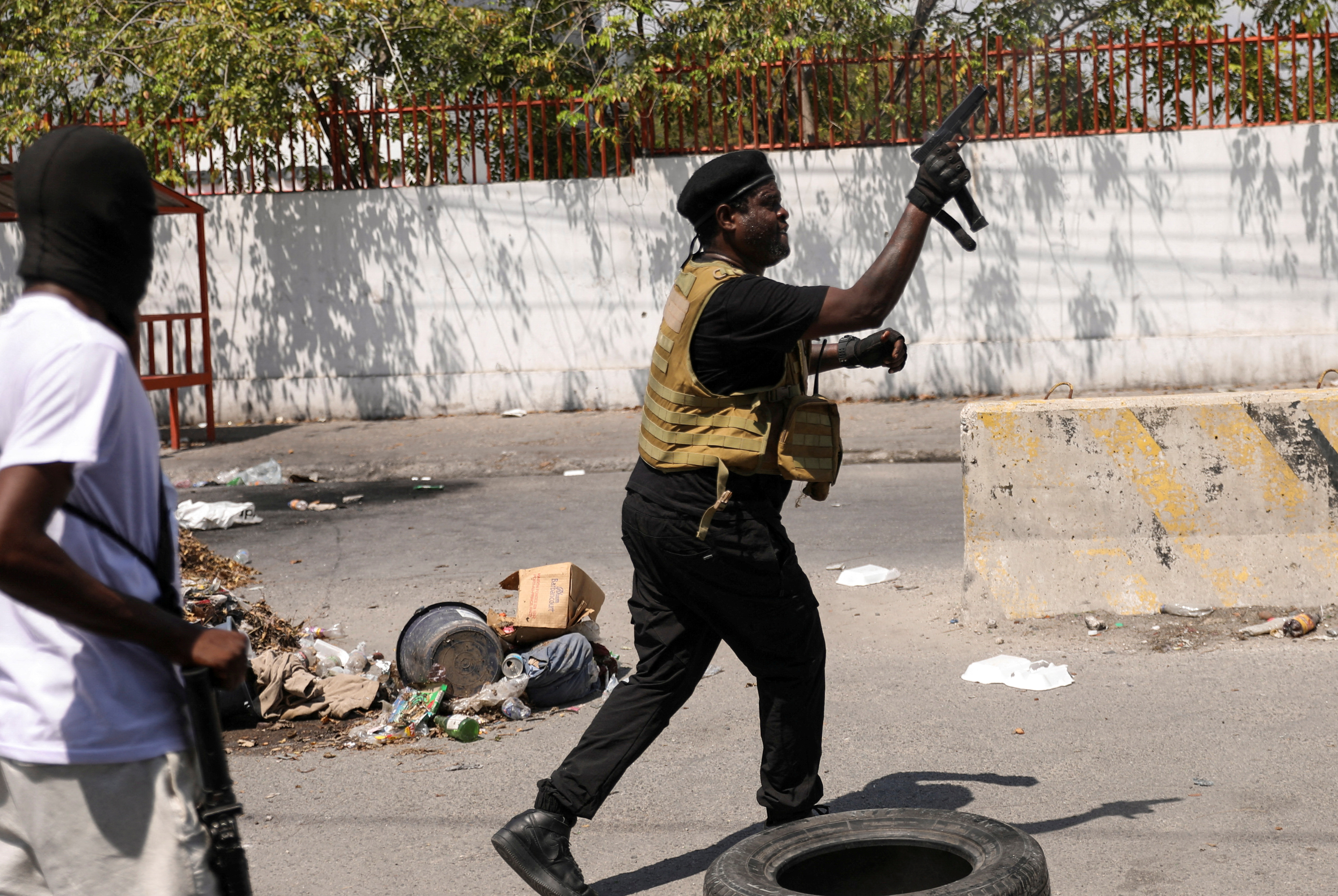 Former police officer Jimmy "Barbecue" Cherizier addresses the media, in Port-au-Prince