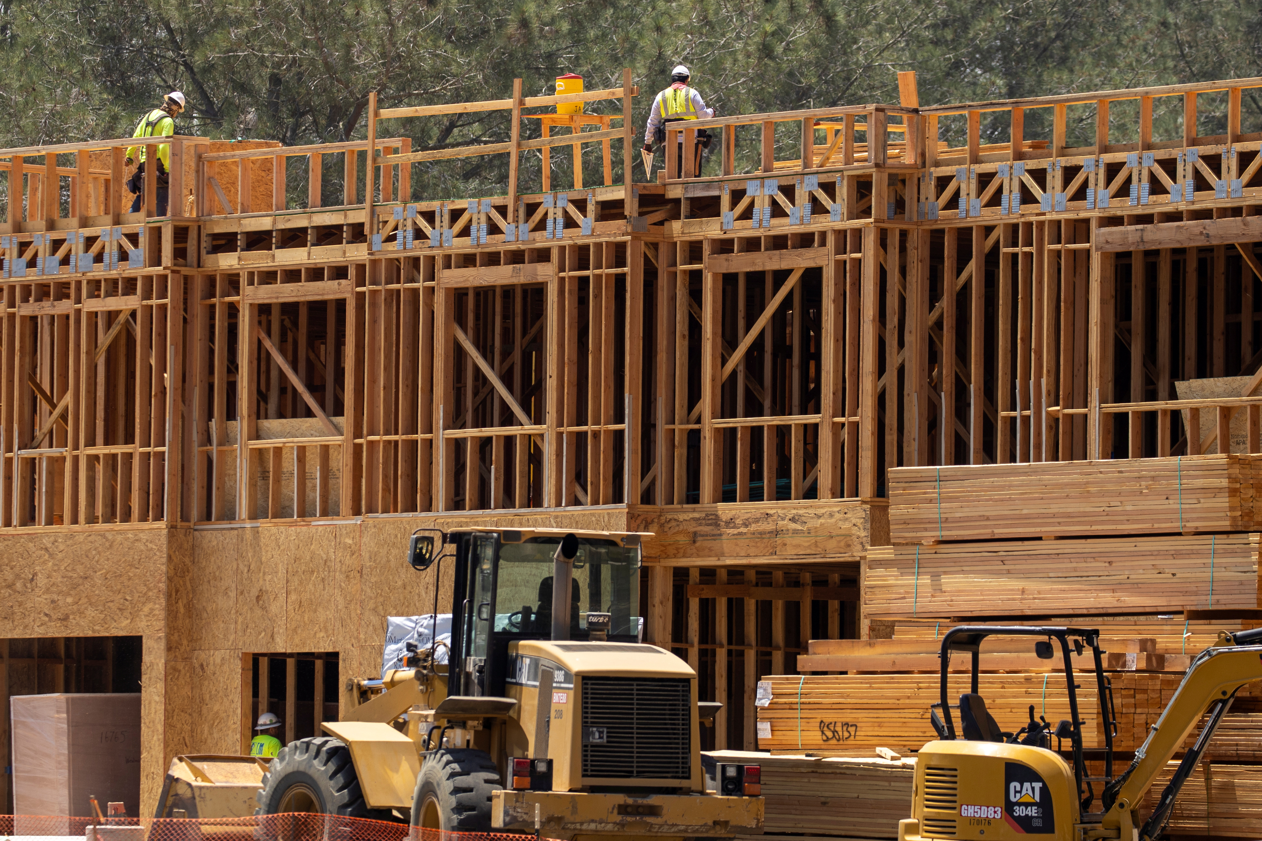 Construction workers on the job at a residential project during the outbreak of the coronavirus disease in California