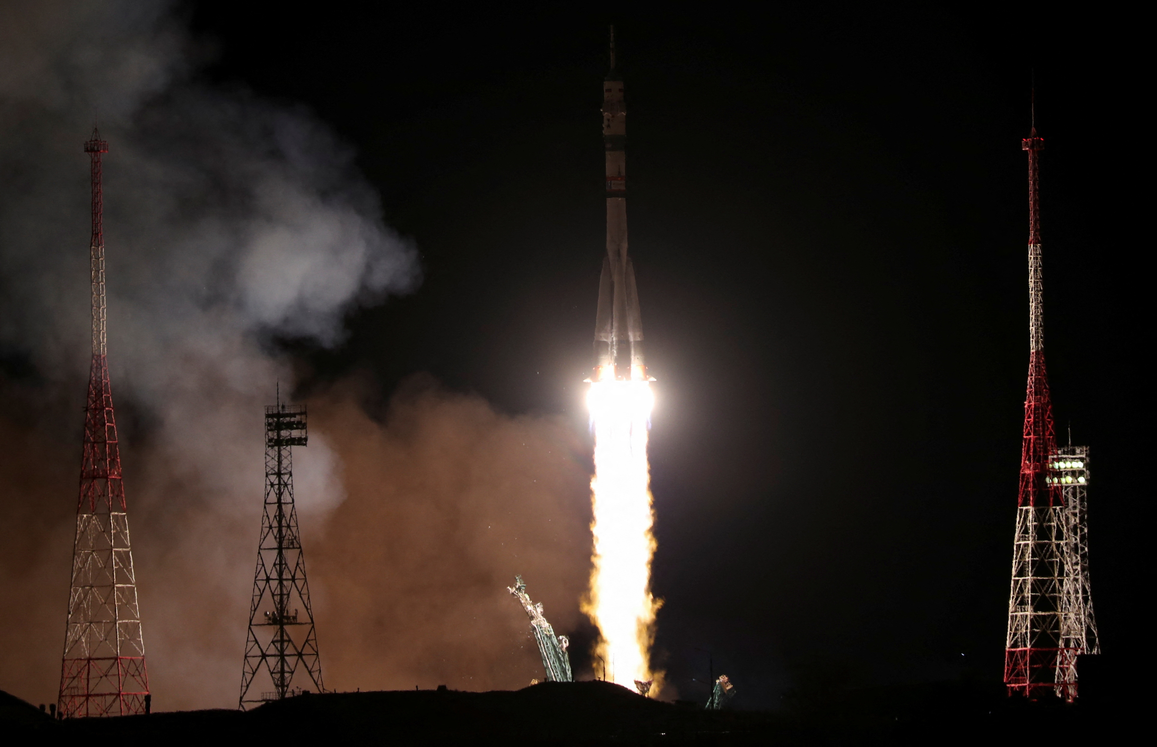 Spacecraft carrying Russians and American docks with International ...