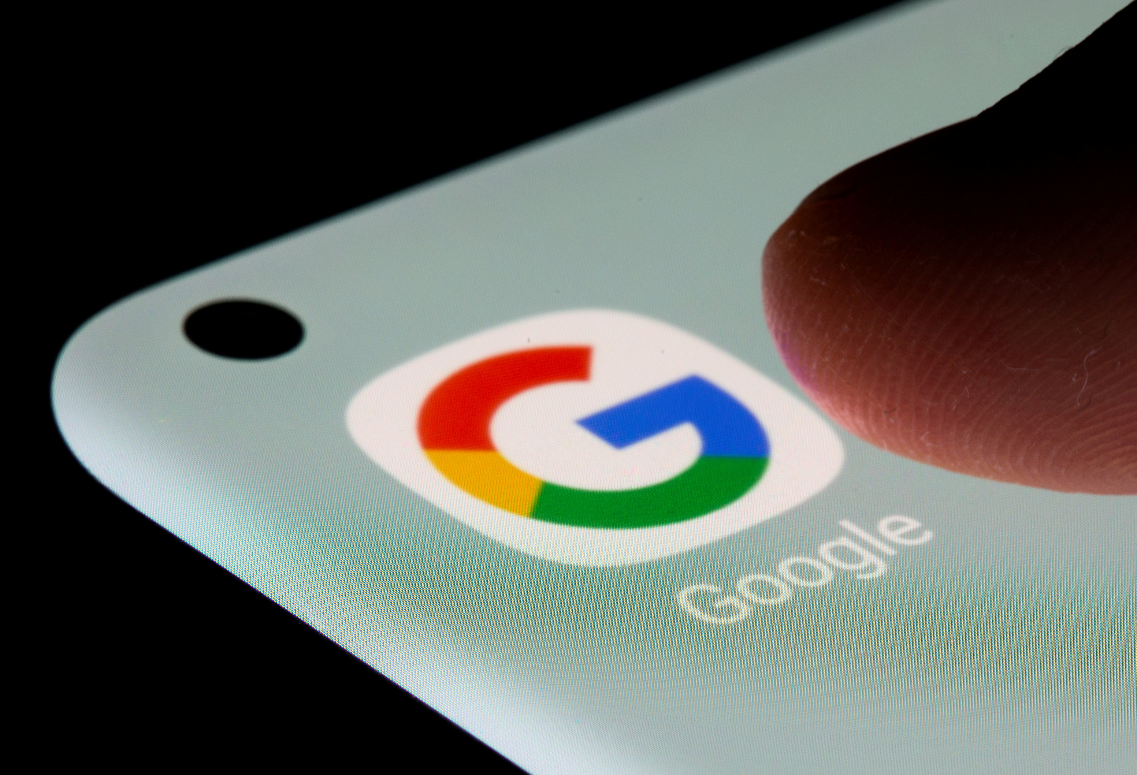 Google app is seen on a smartphone in this illustration taken, July 13, 2021. REUTERS/Dado Ruvic/Illustration/File Photo